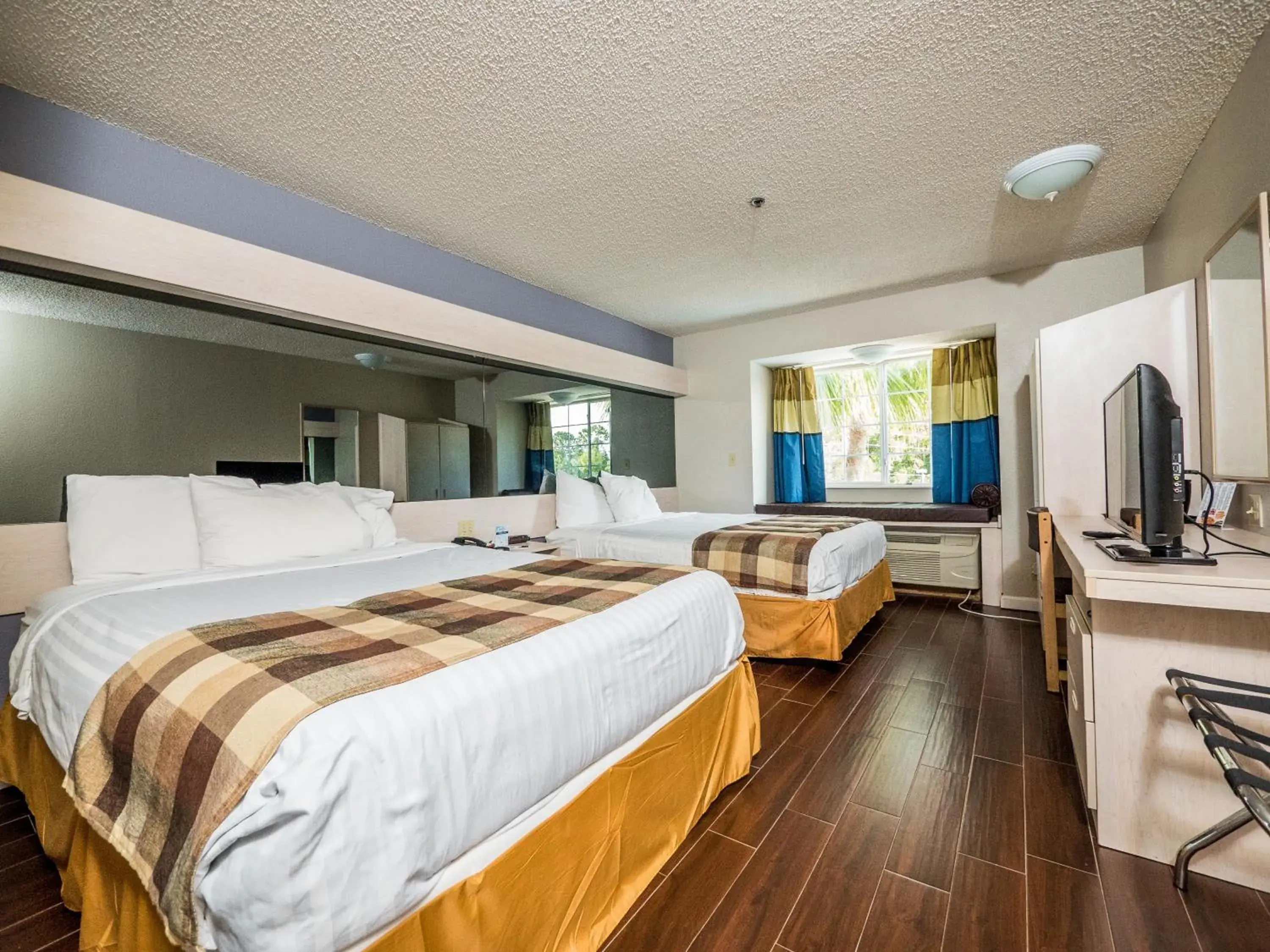 Bedroom, Bed in Microtel Inn & Suites by Wyndham Palm Coast I-95 Bedroom, Bed in Microtel Inn & Suites by Wyndham Palm Coast I-95