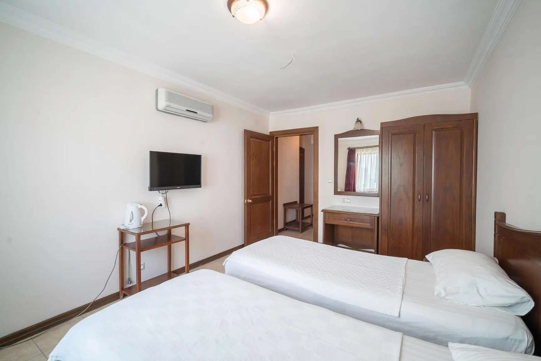 Bed in Fora Apart Hotel