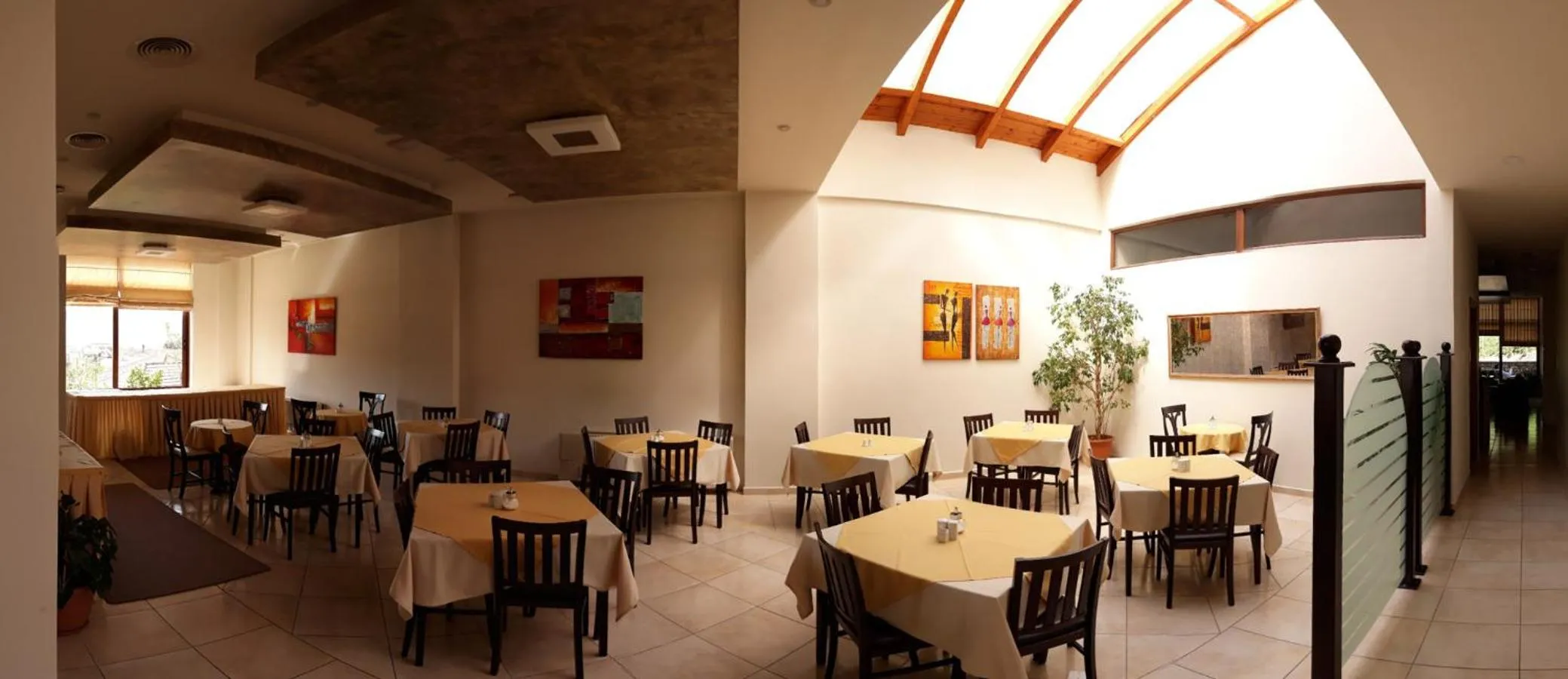 Dining area in Ahilion Hotel