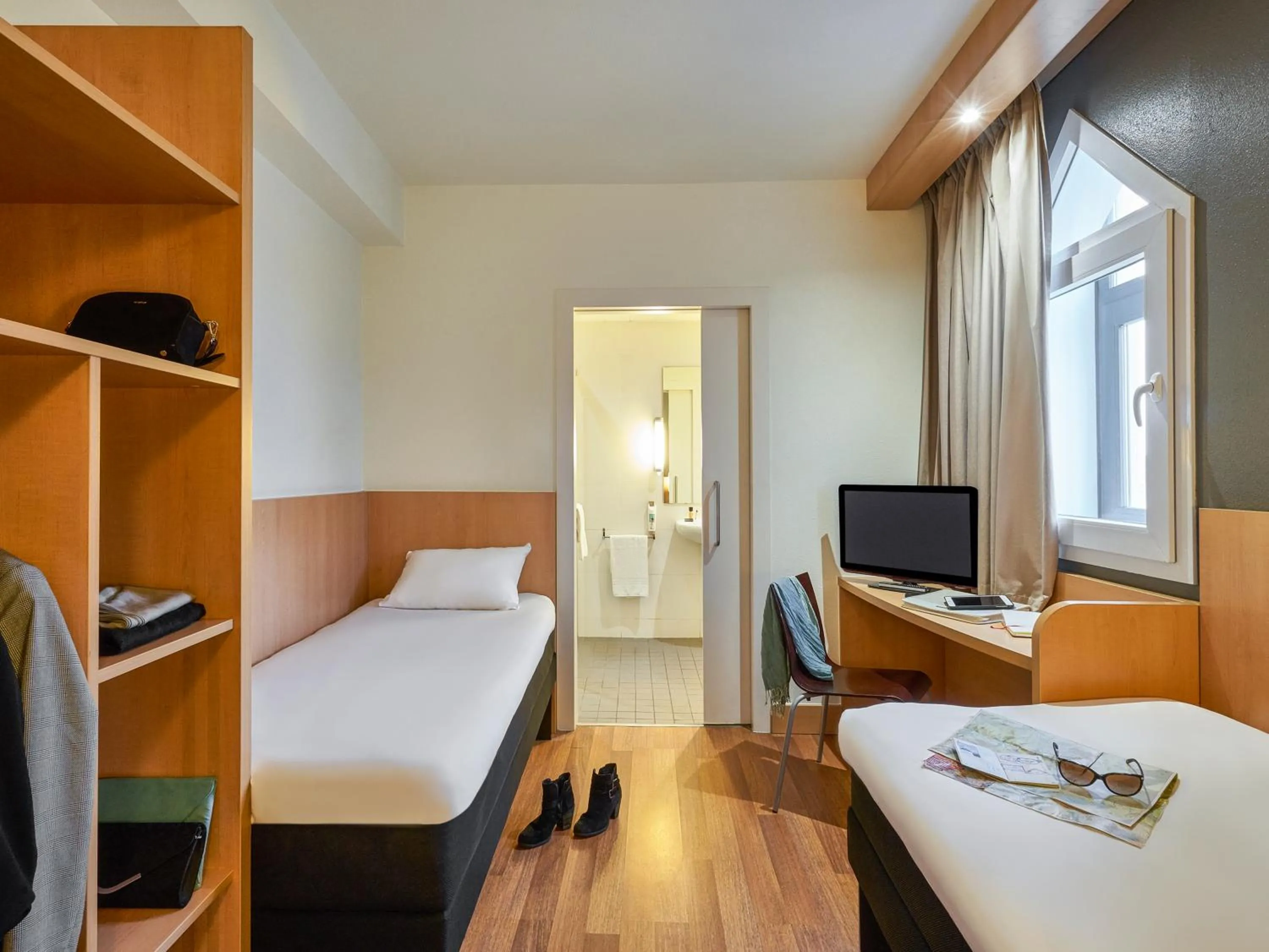 Bed in Ibis Barcelona Meridiana