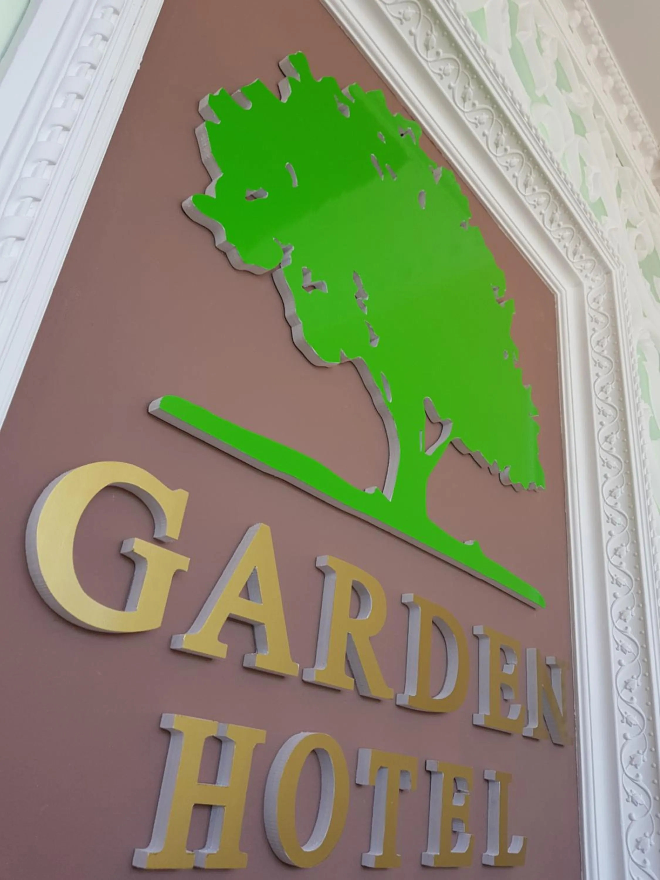 Property logo or sign in Garden Hotel