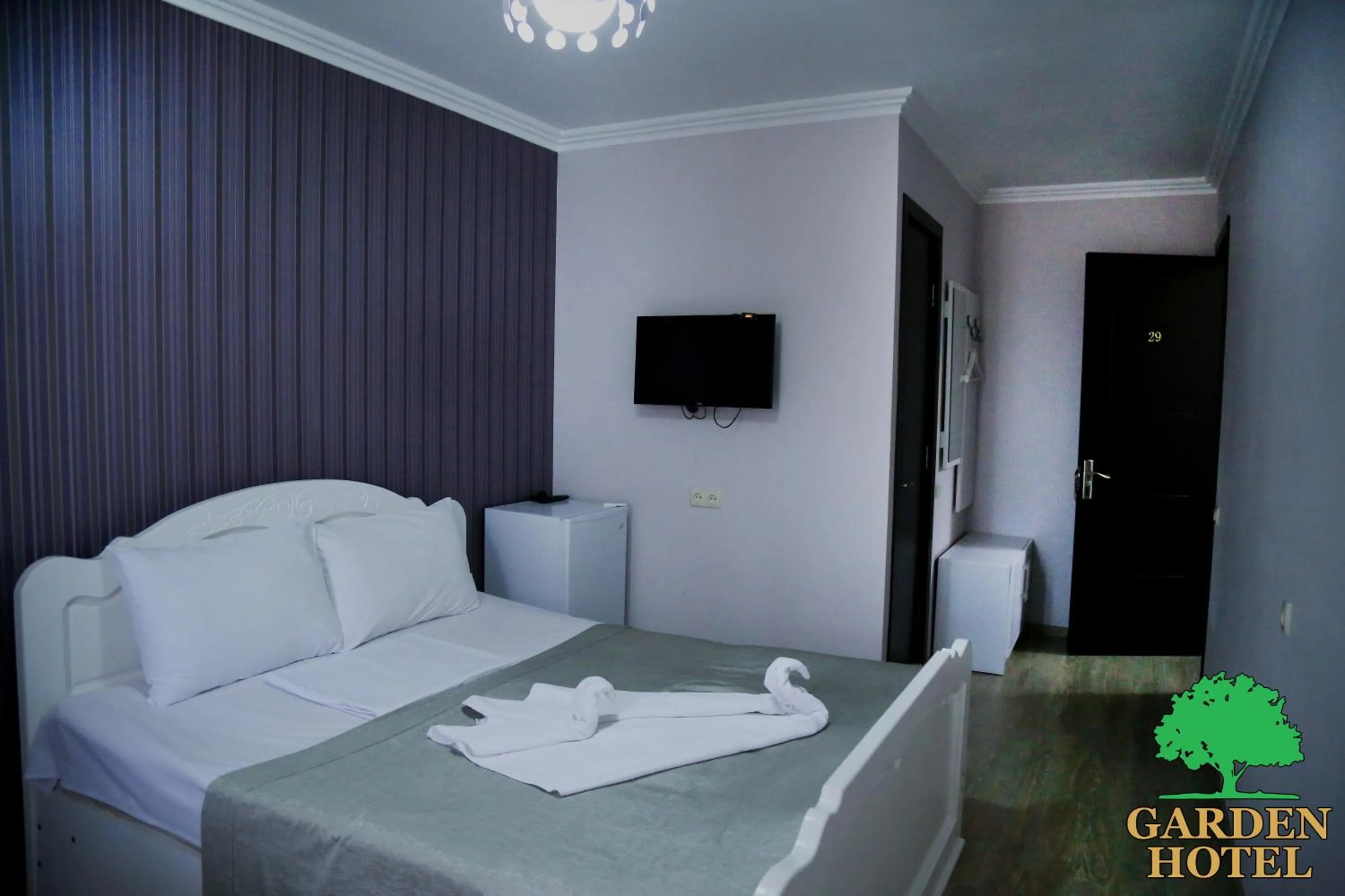 Bedroom, Bed in Garden Hotel