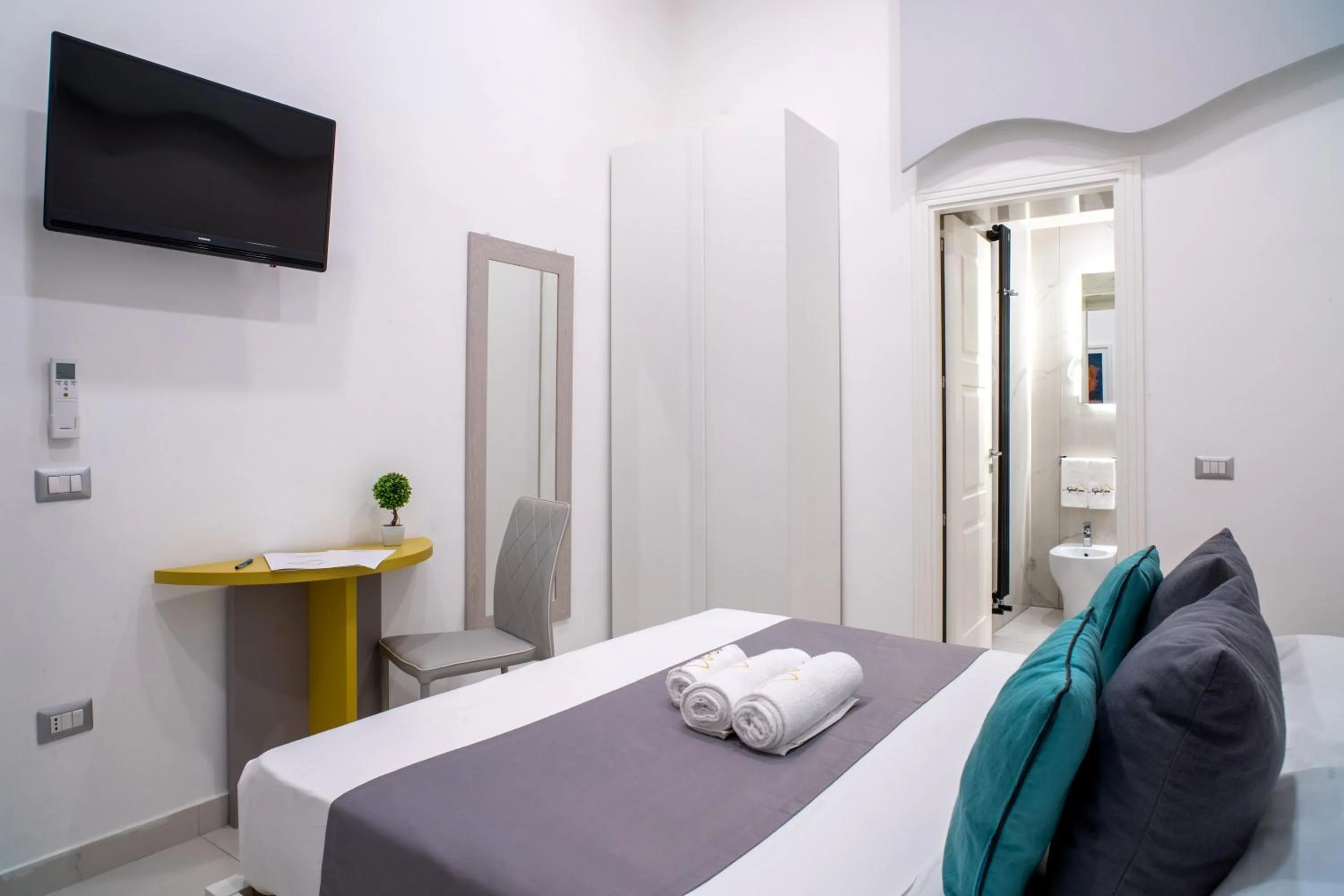 Bed in Napoliviva Bovio