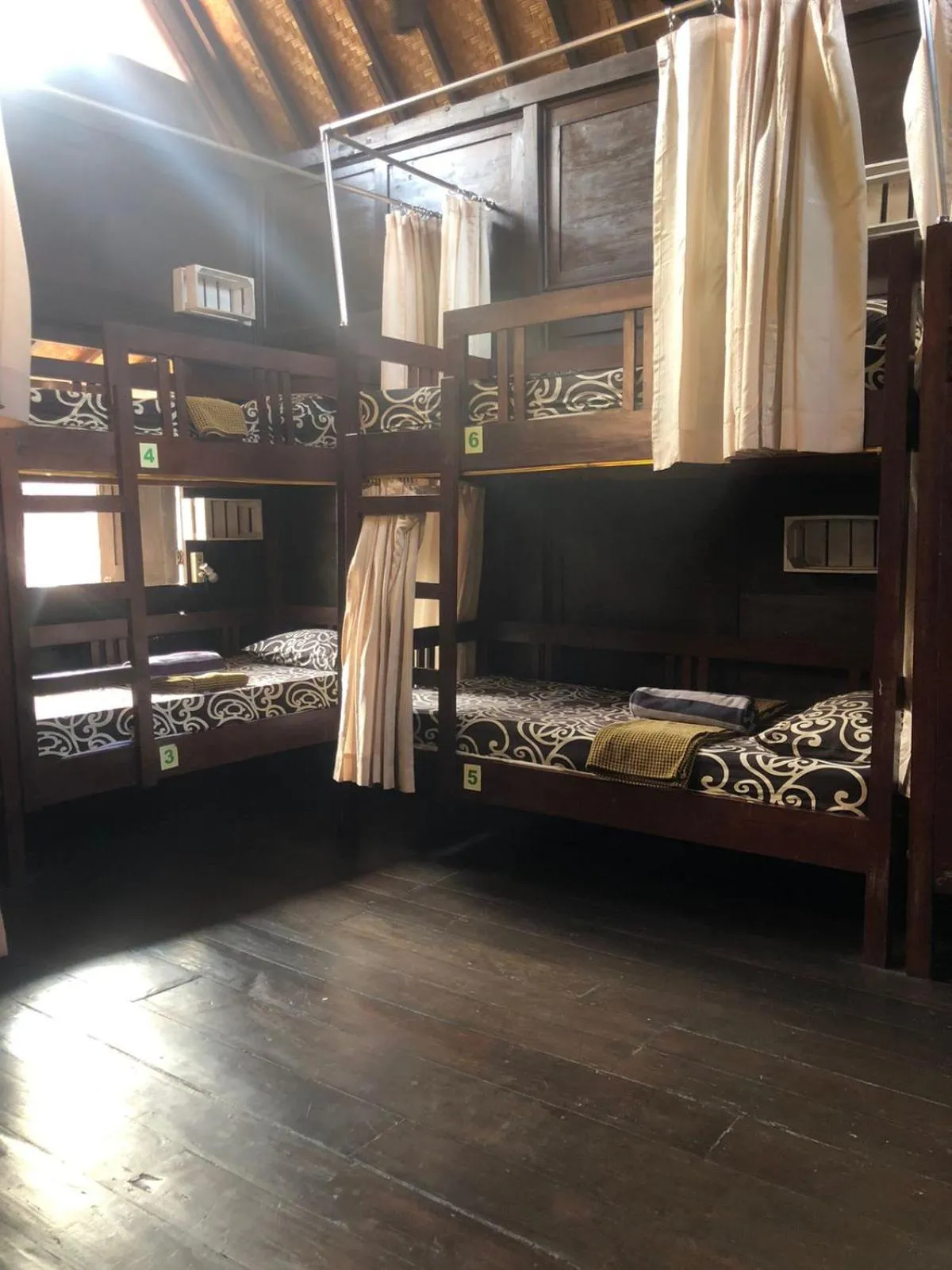 Bed in 8-Bed Dormitory Room in Green Paddy Hostel & Villa