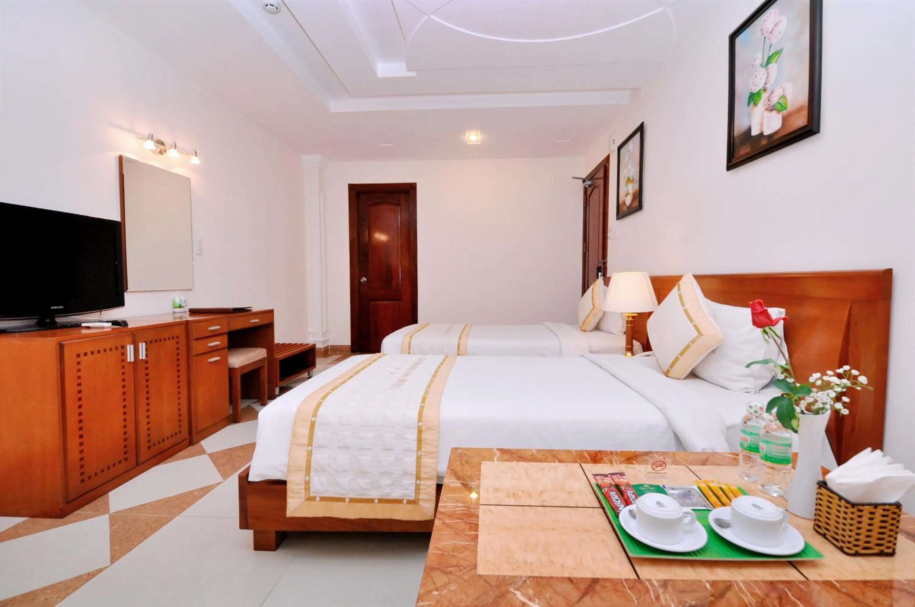 Bed in Tan Hoang Long Hotel