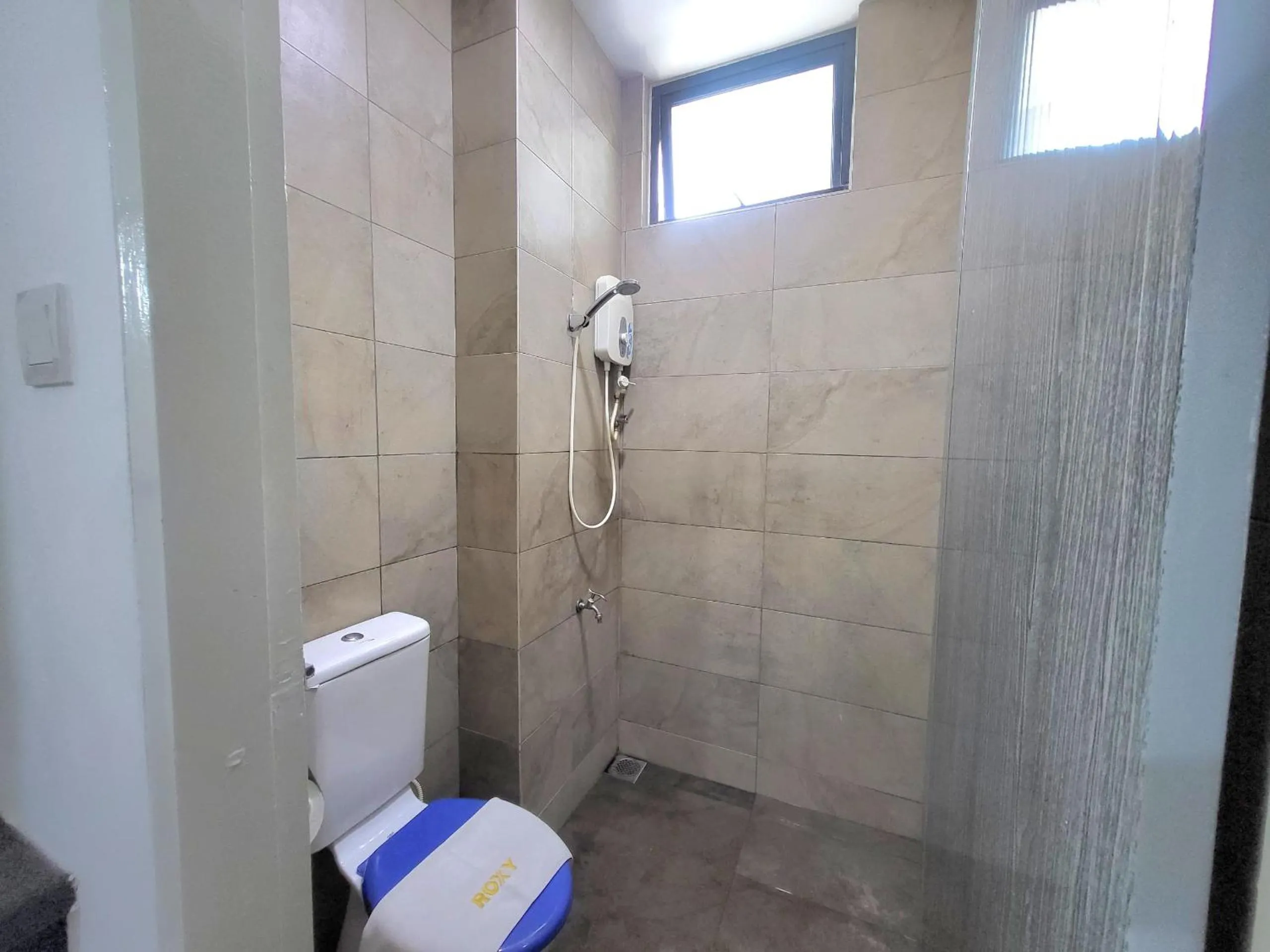 Bathroom in Roxy Hotel & Apartments