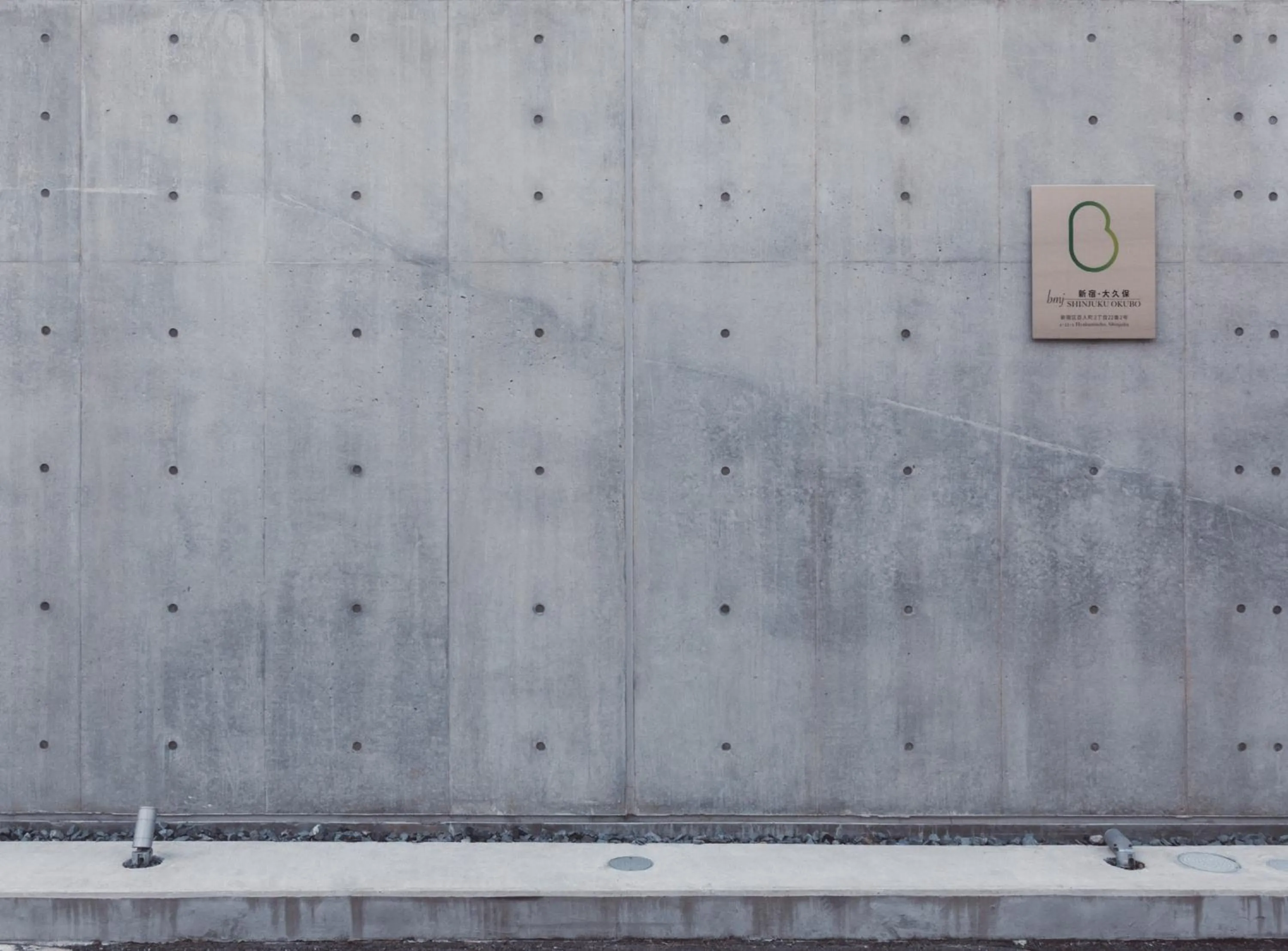 Property logo or sign in bmj Shinjuku Okubo