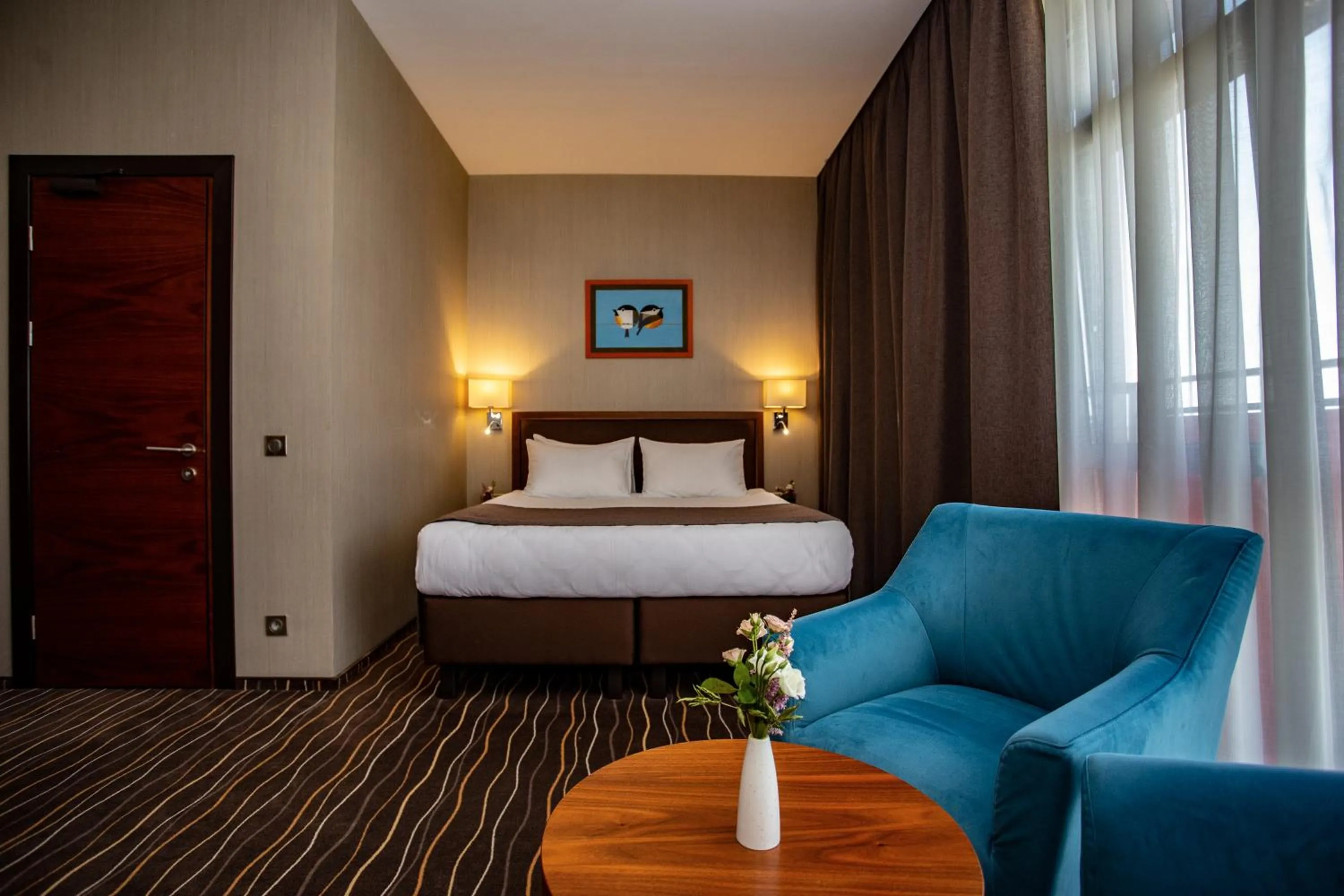 Bed in Taurus City Hotel