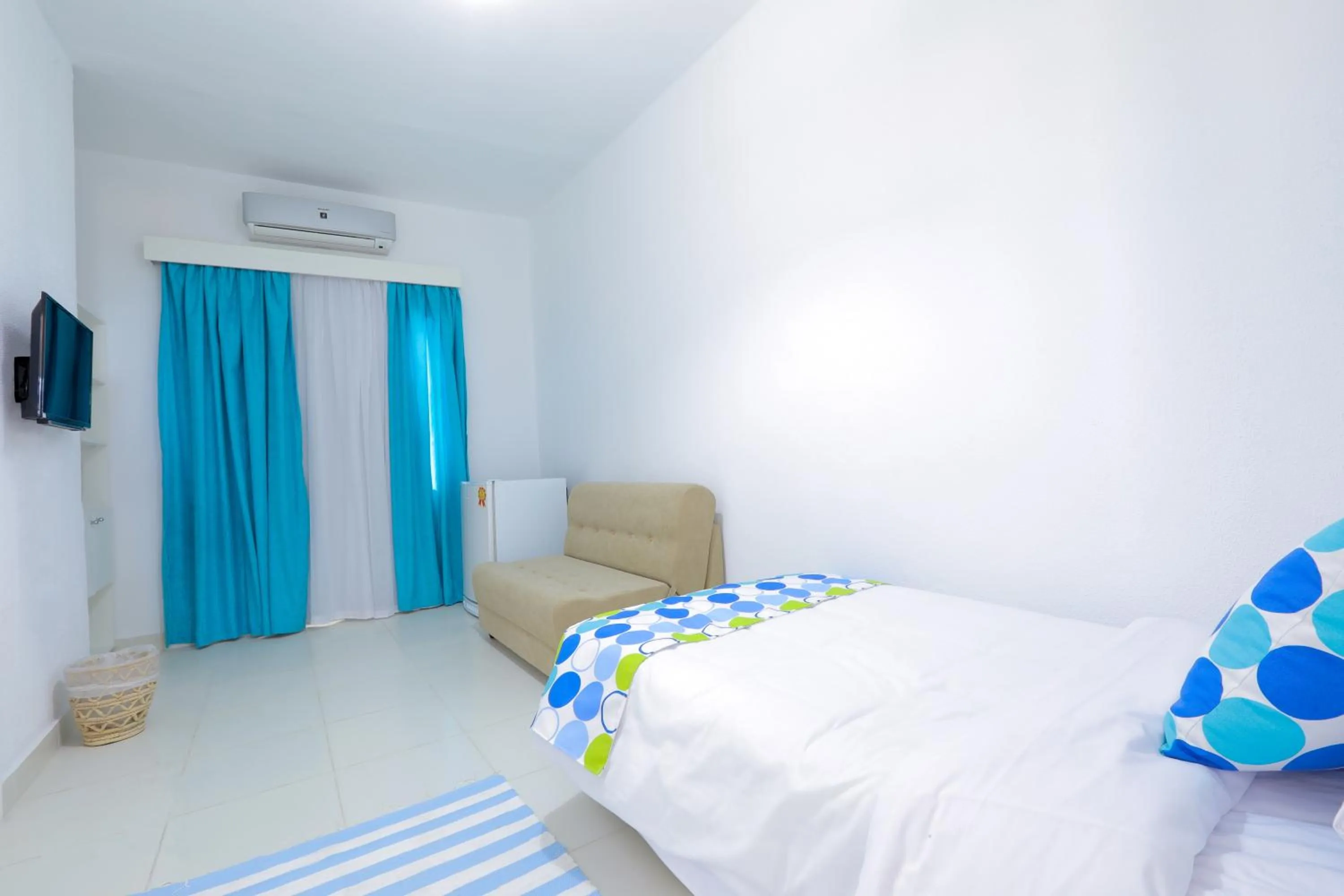 Bed in Lagoonie Lodge & Beach