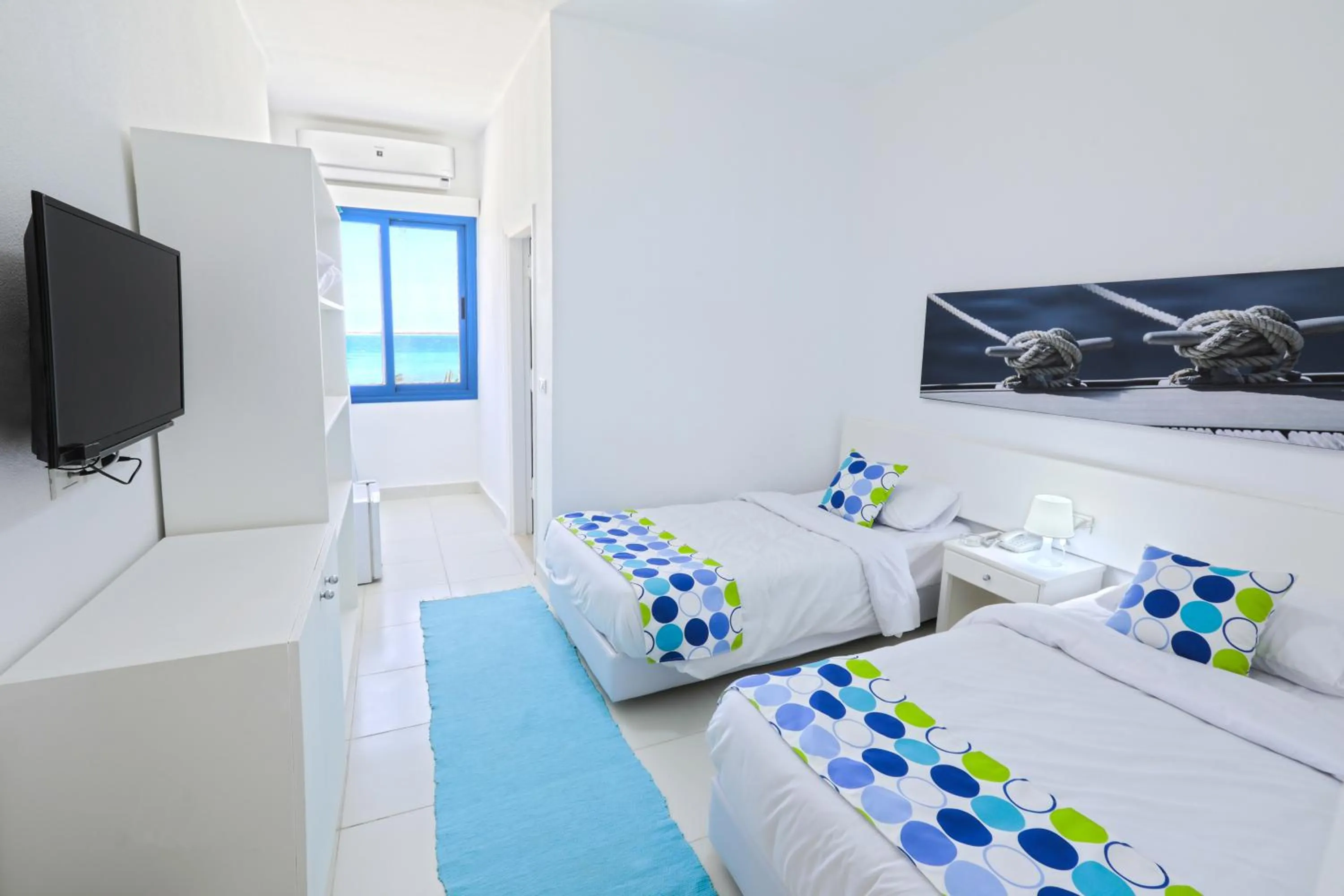 Bed in Lagoonie Lodge & Beach