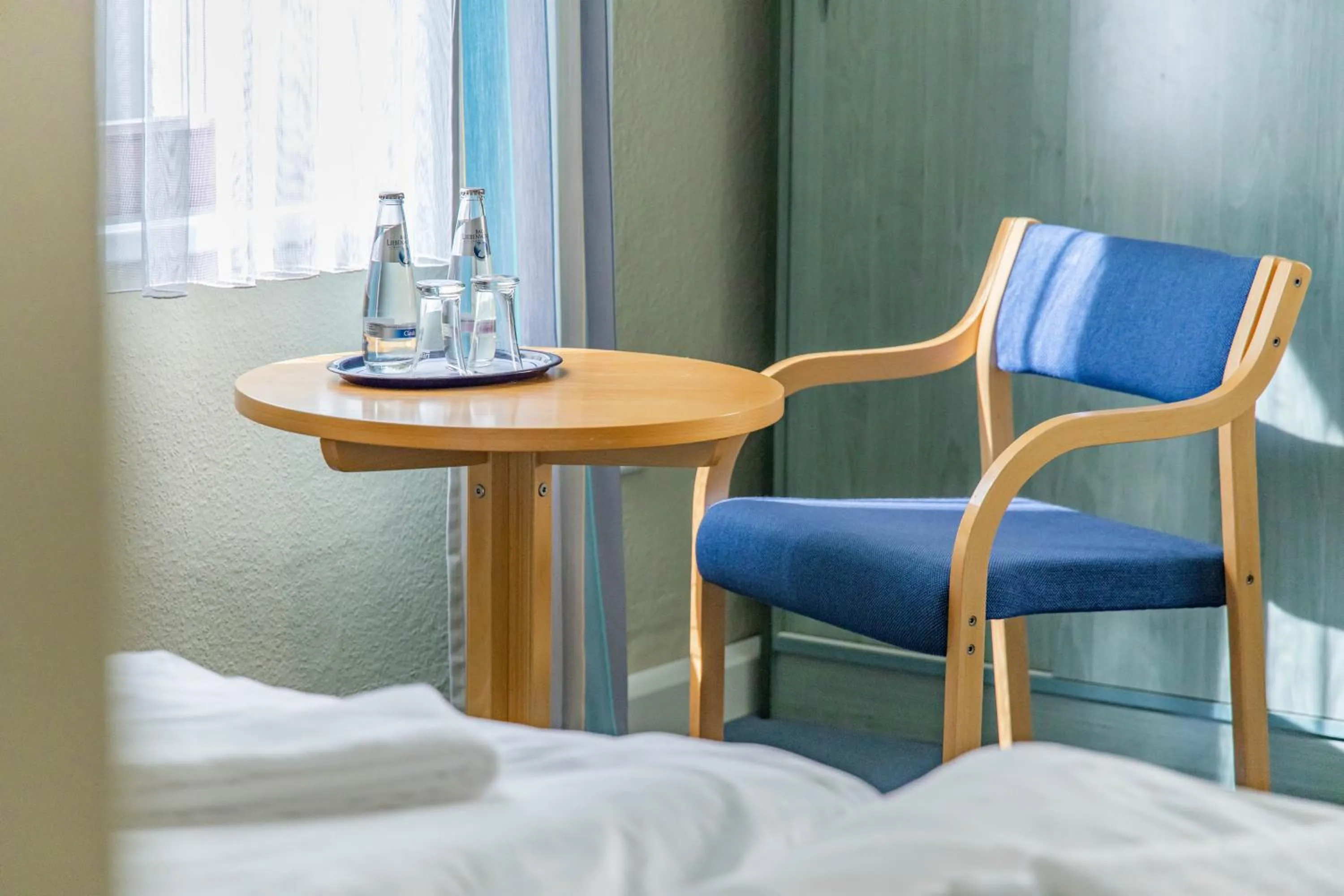 Seating area, Bed in Gästehaus Chorin
