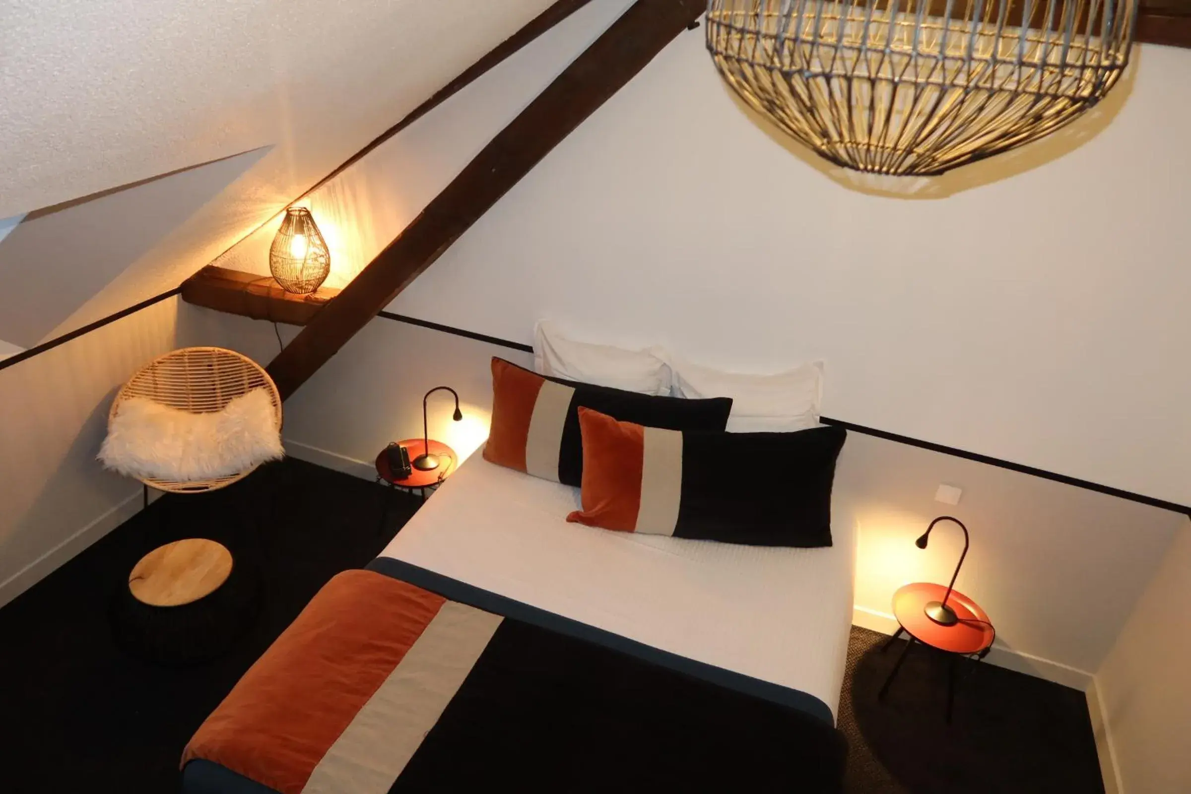 Bed in Hotel Spa Azteca Barcelonnette Bed in Hotel Spa Azteca Barcelonnette