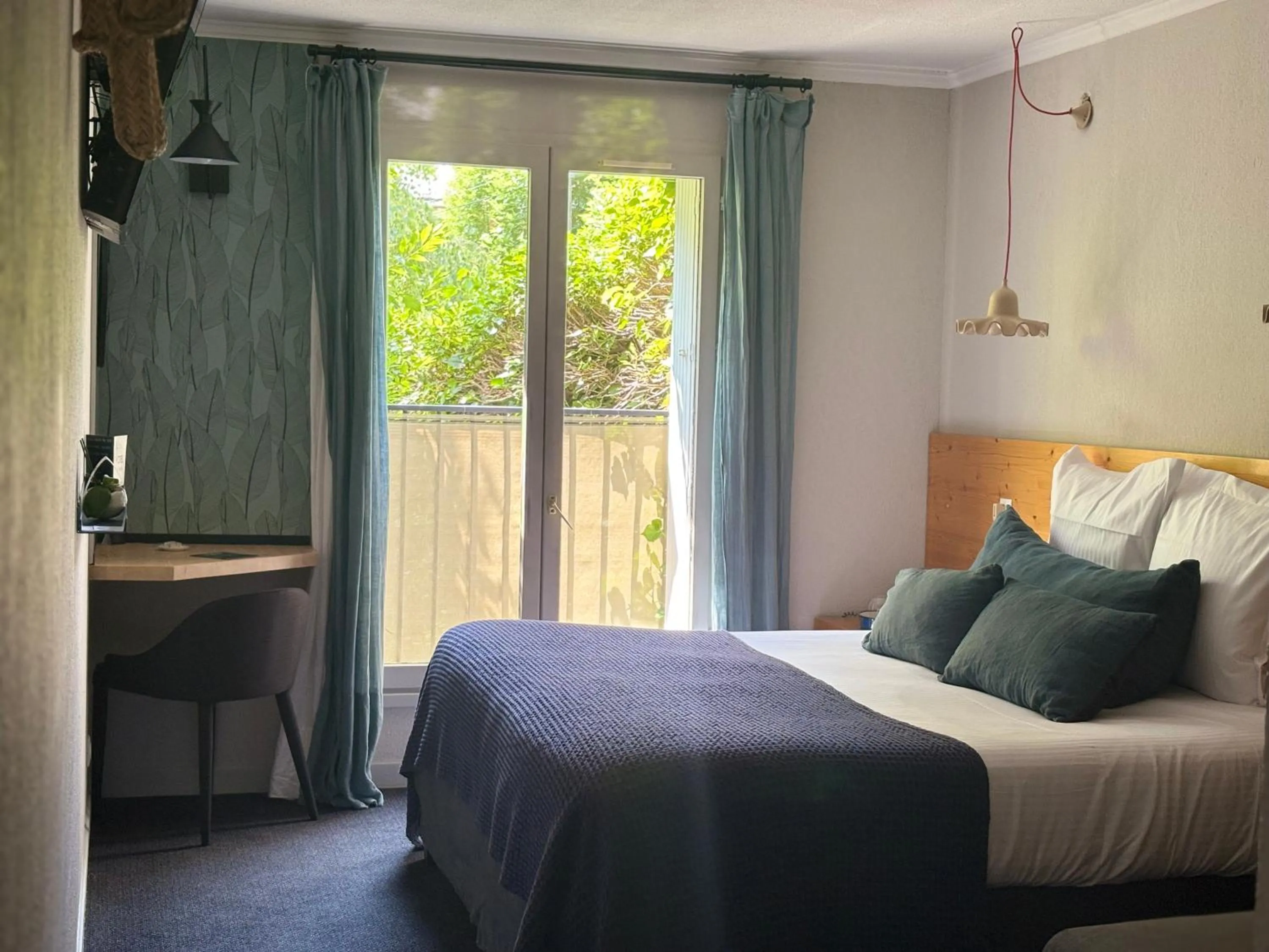 Bed in Hotel Spa Azteca Barcelonnette