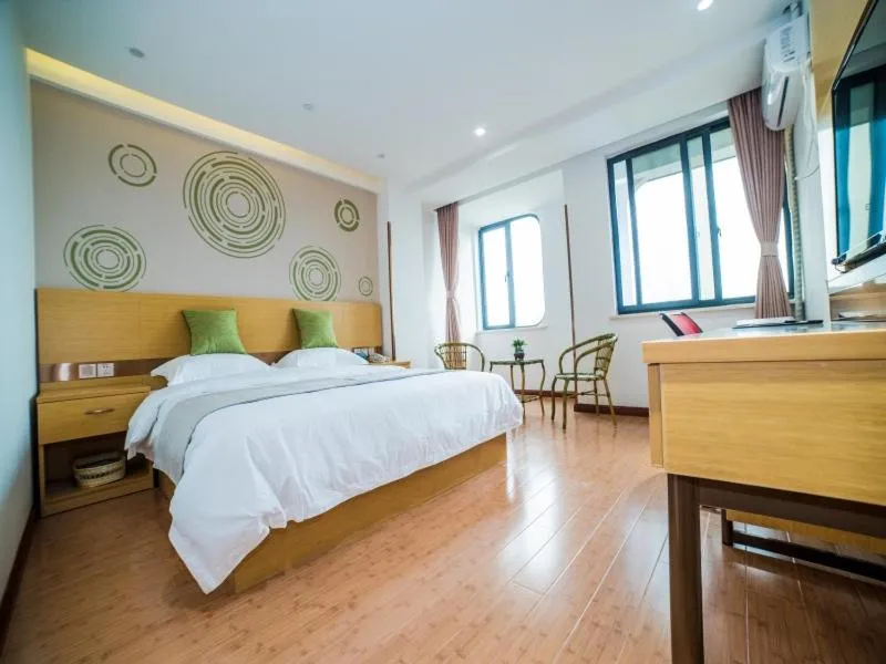 Bed in GreenTree Inn Zhejiang Ningbo District Huashan Road And Huanghe Road Express Hotel