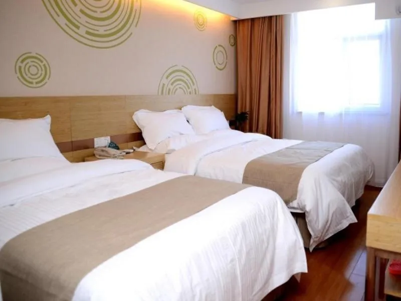 Bed in GreenTree Qinghai Hainan Tibetan autonomous prefecture Gonghe County Express Hotel