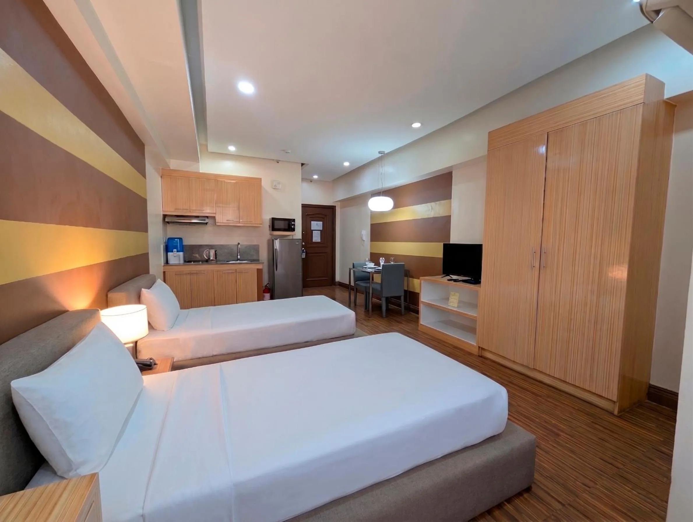 Bed in Prince Plaza II Condotel