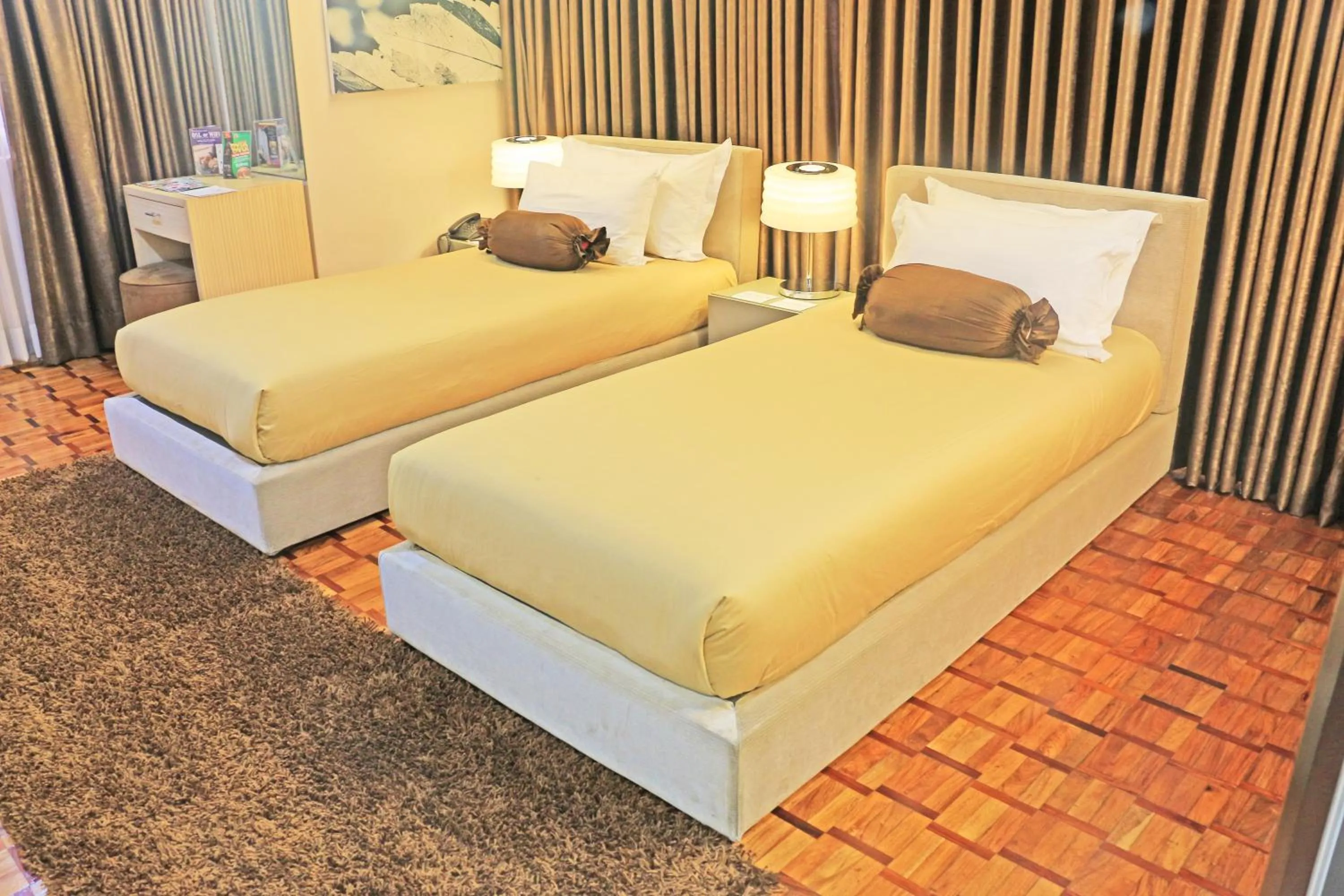 Bed in Prince Plaza II Condotel