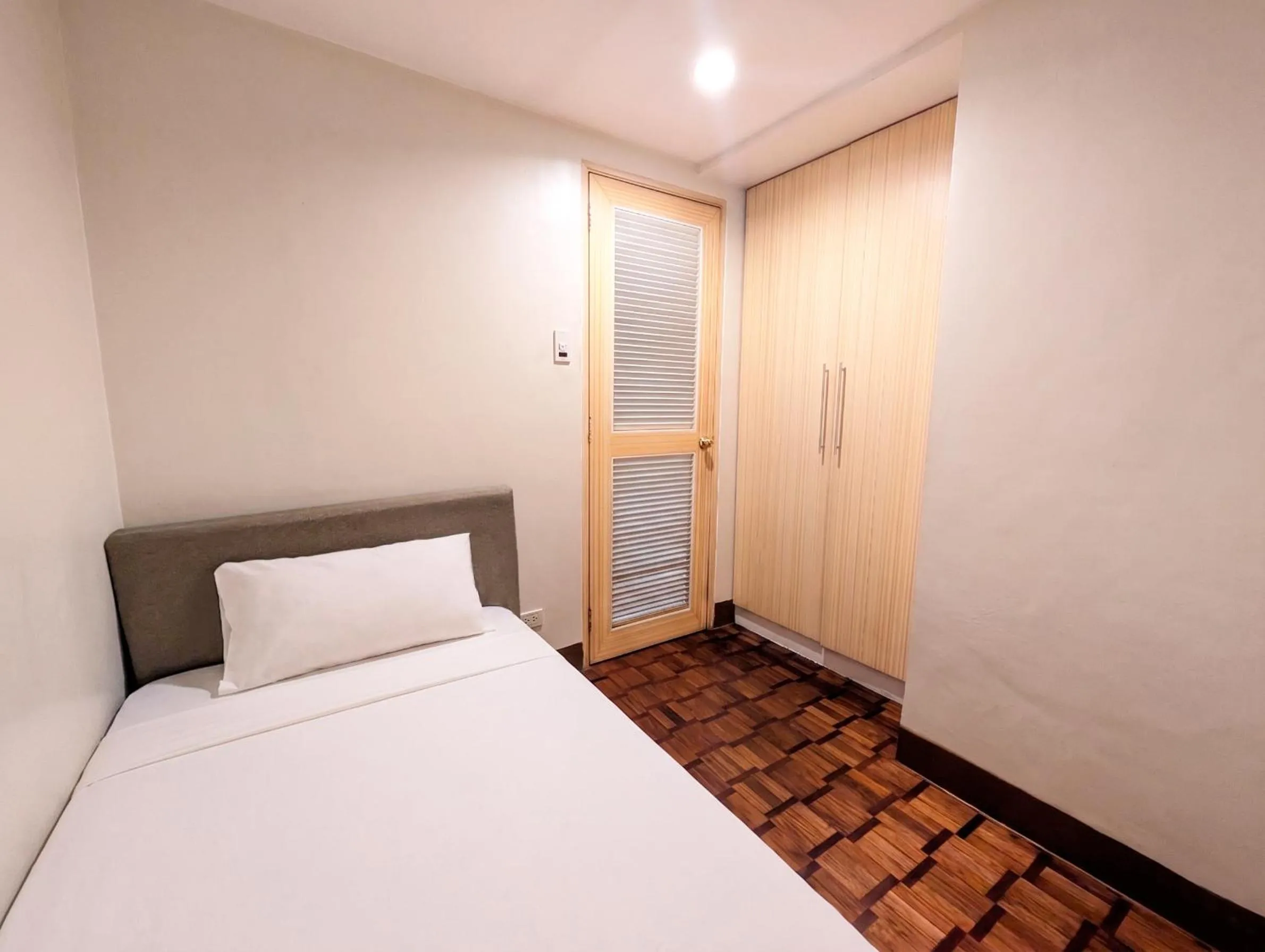 Bed in Prince Plaza II Condotel