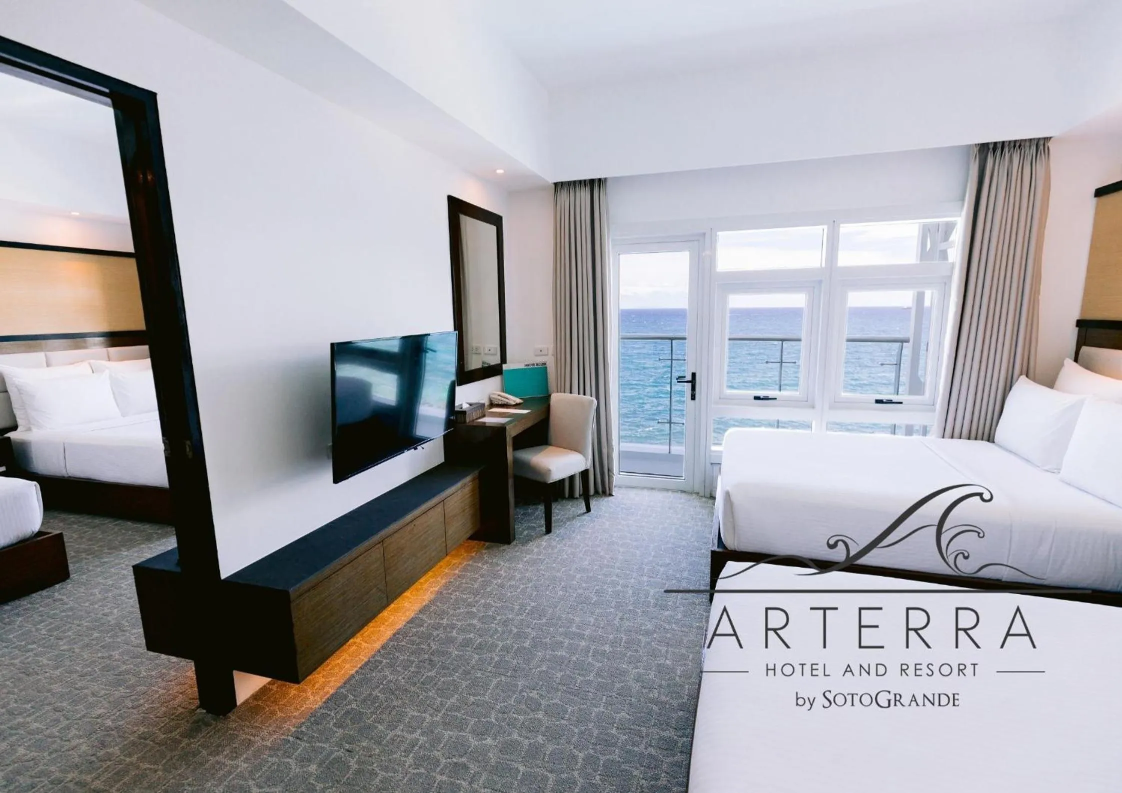 Bed in Arterra Hotel and Resort
