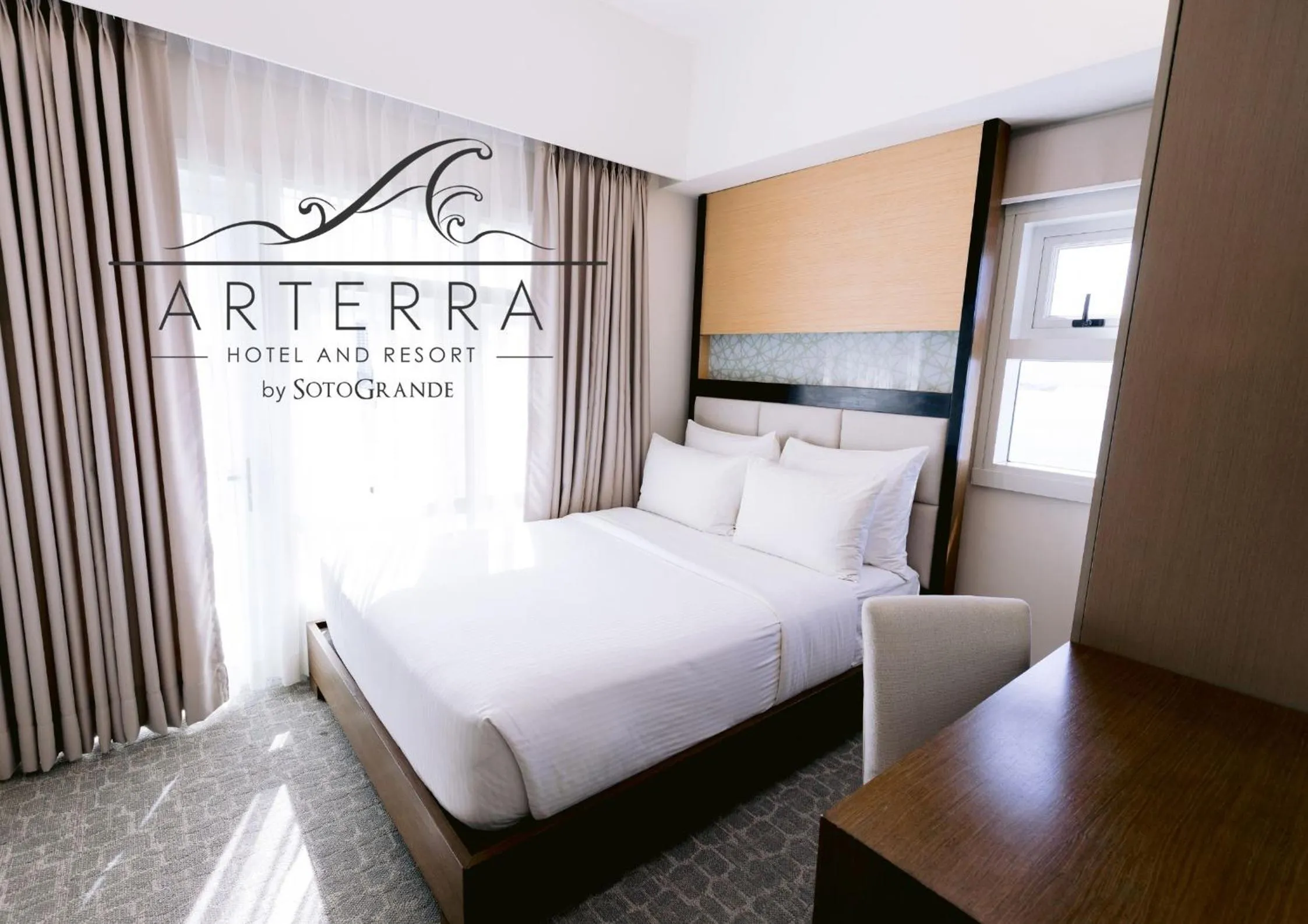 Bed in Arterra Hotel and Resort