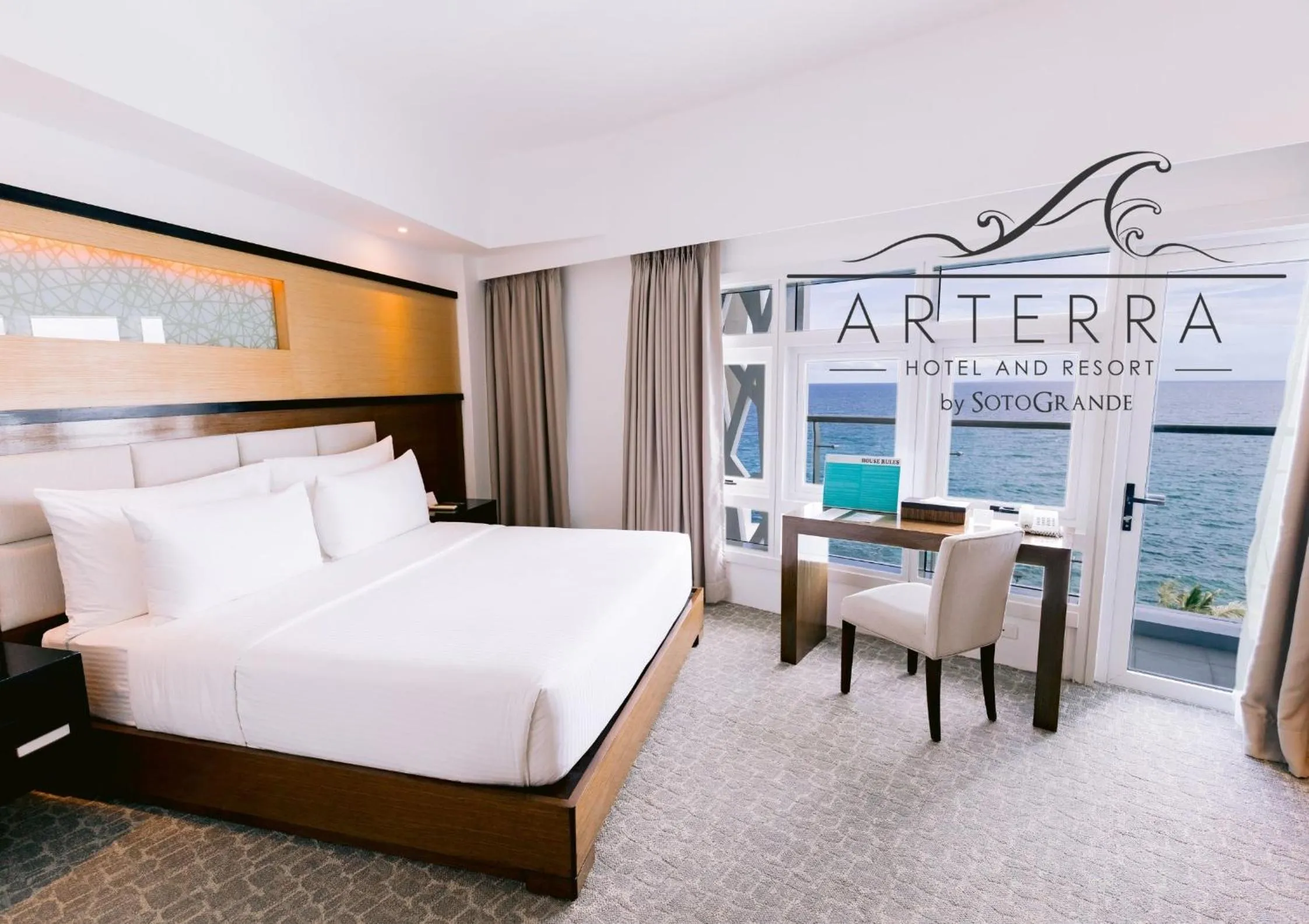 Bed in Arterra Hotel and Resort