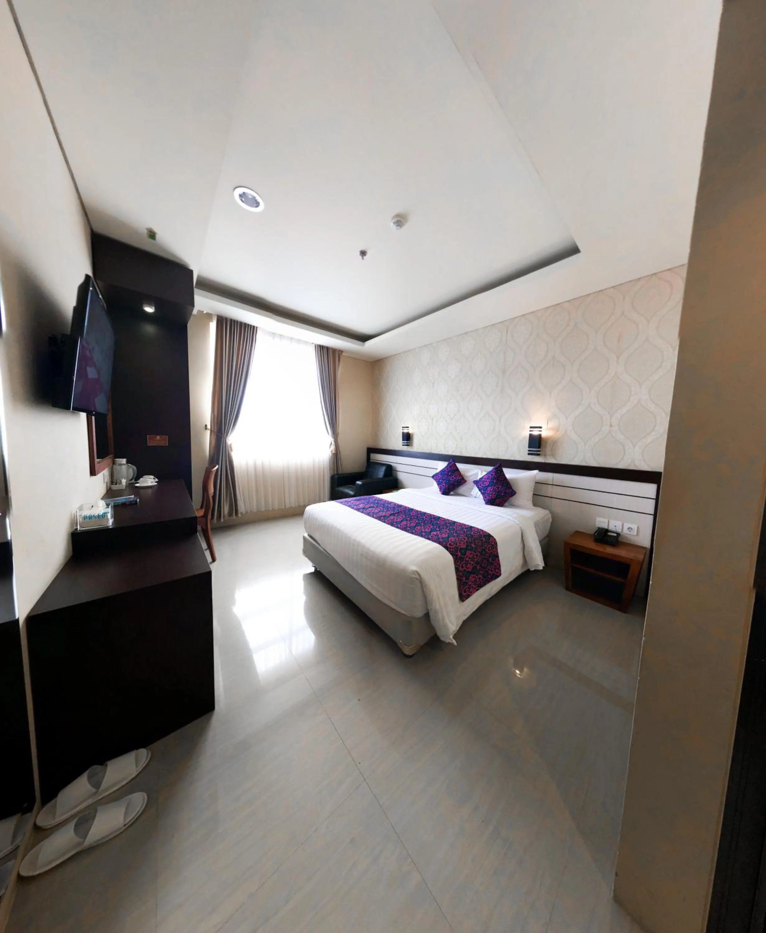 Bedroom, Bed in Grand Madani Hotel