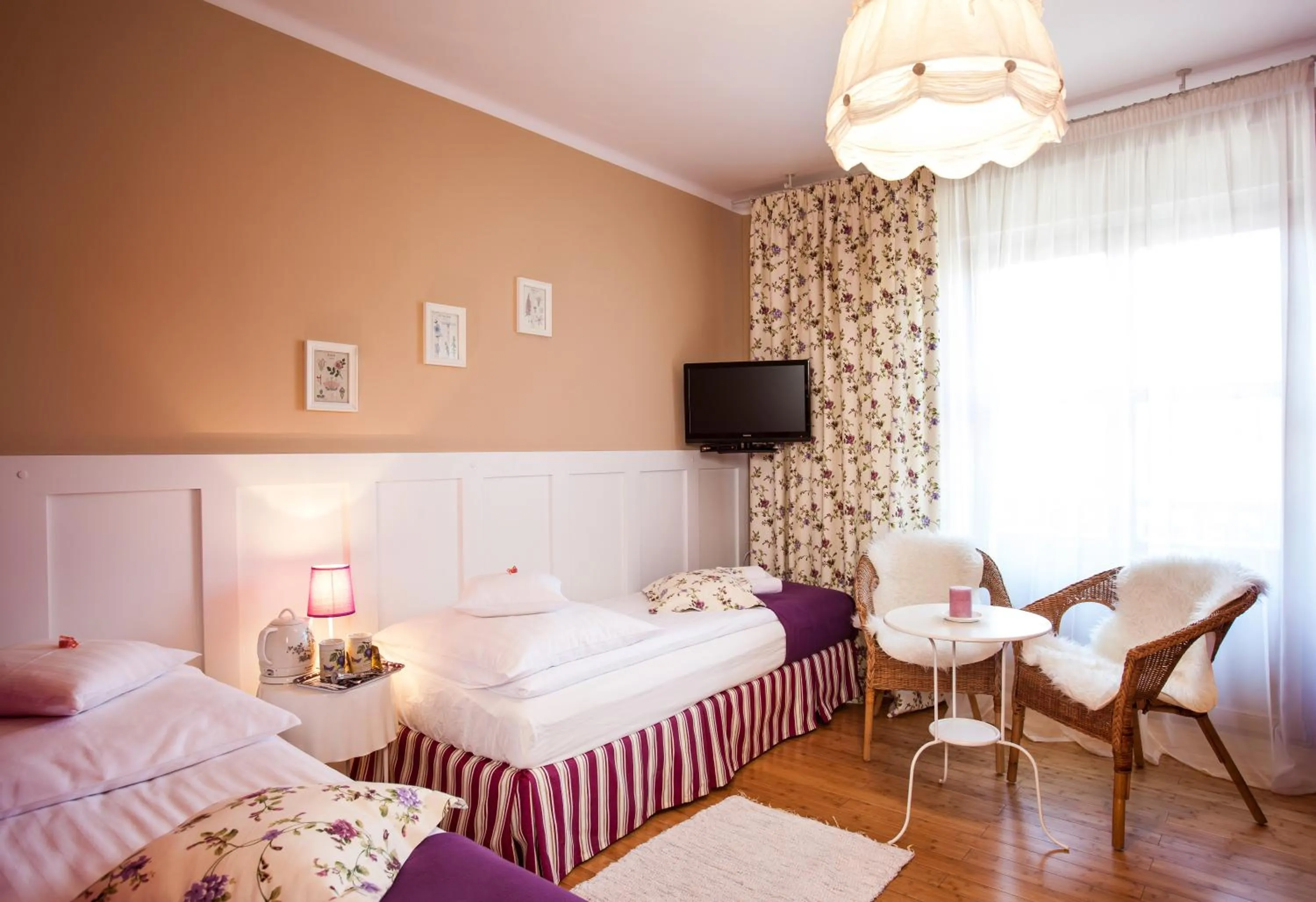 Bed in Villa Cynamon Jacuzzi & Sauna