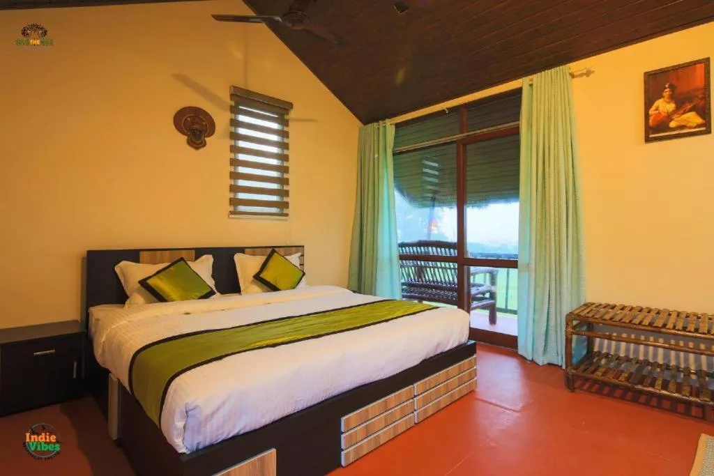 Bed in KOOMANKOLLY RESORT