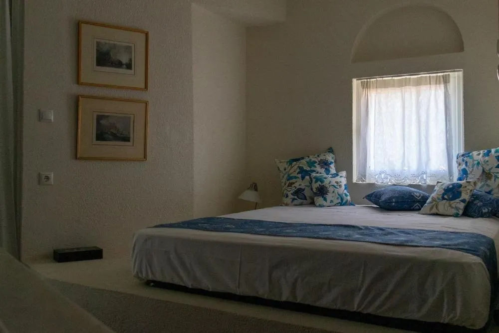 Bedroom, Bed in Grand Bleu Apartments & Villas