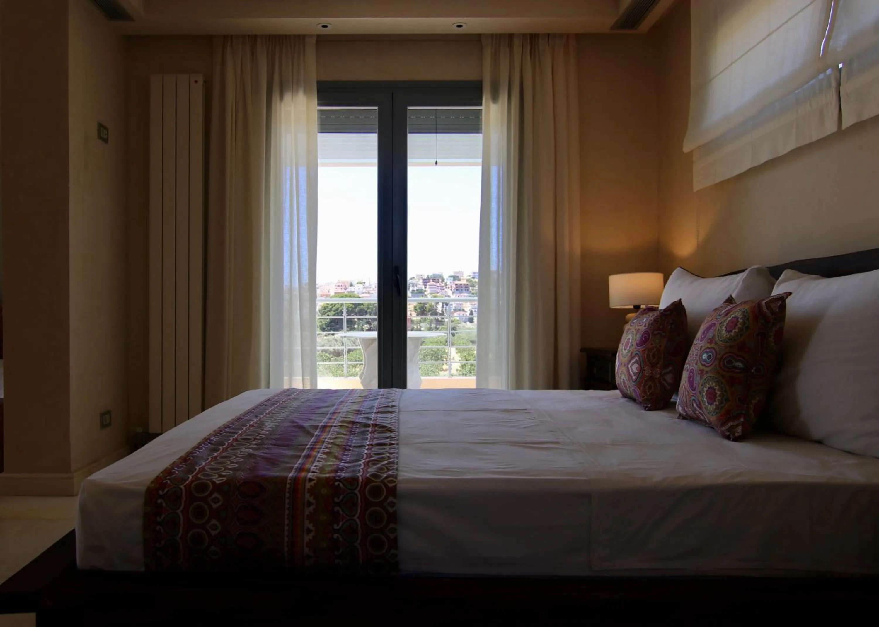 Bedroom, Bed in Grand Bleu Apartments & Villas