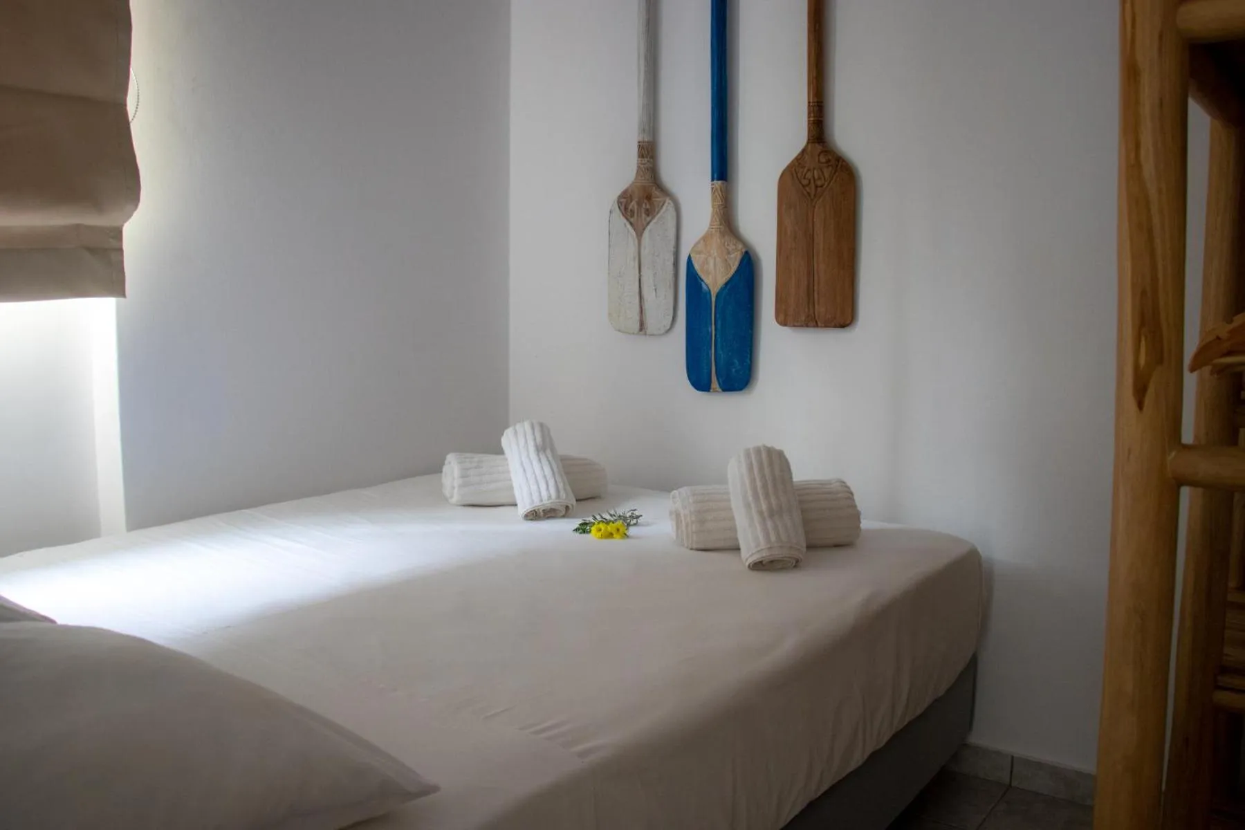 Bed in Grand Bleu Apartments & Villas