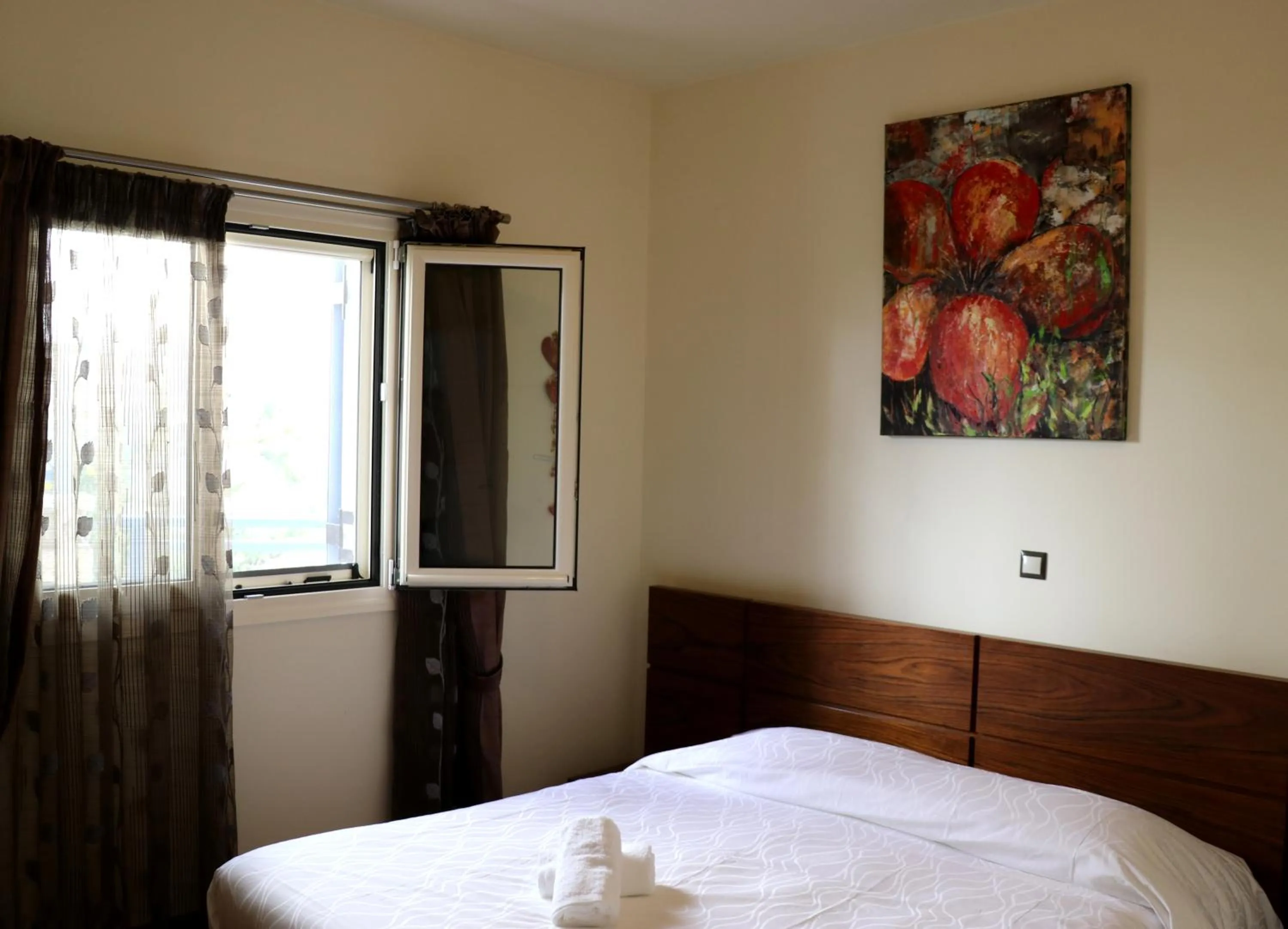 Bedroom, Bed in Grand Bleu Apartments & Villas