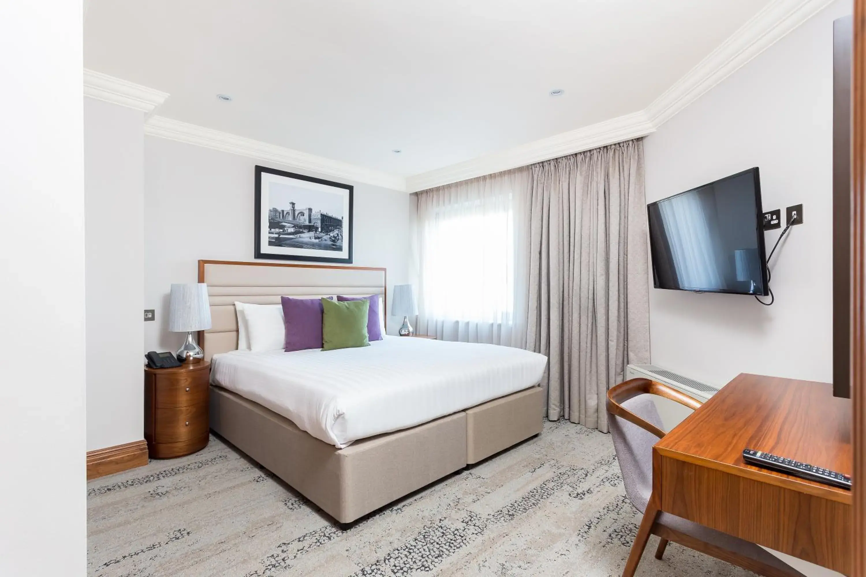 Bed in Sanctum International Serviced Apartments