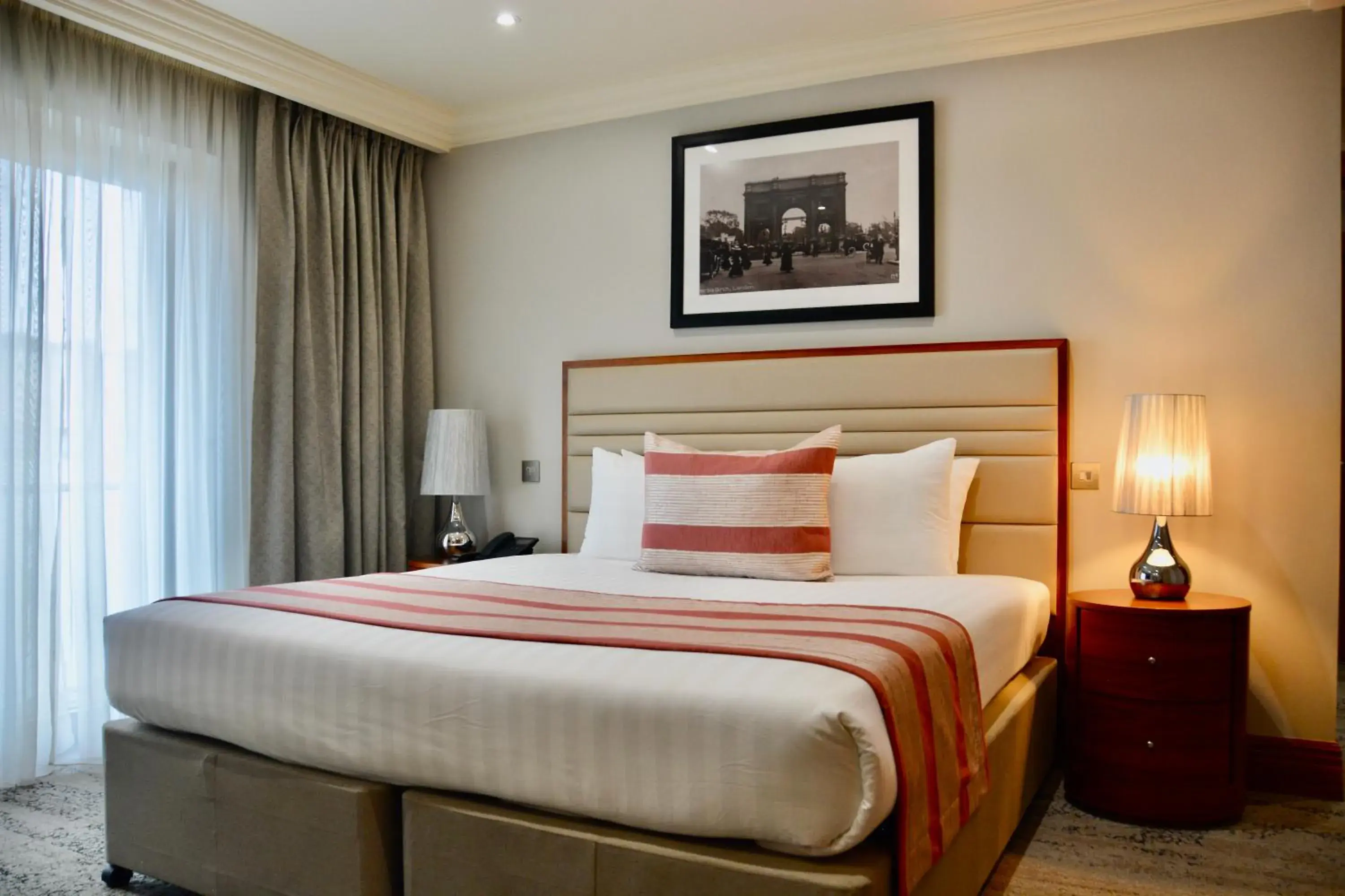 Bed in Sanctum International Serviced Apartments