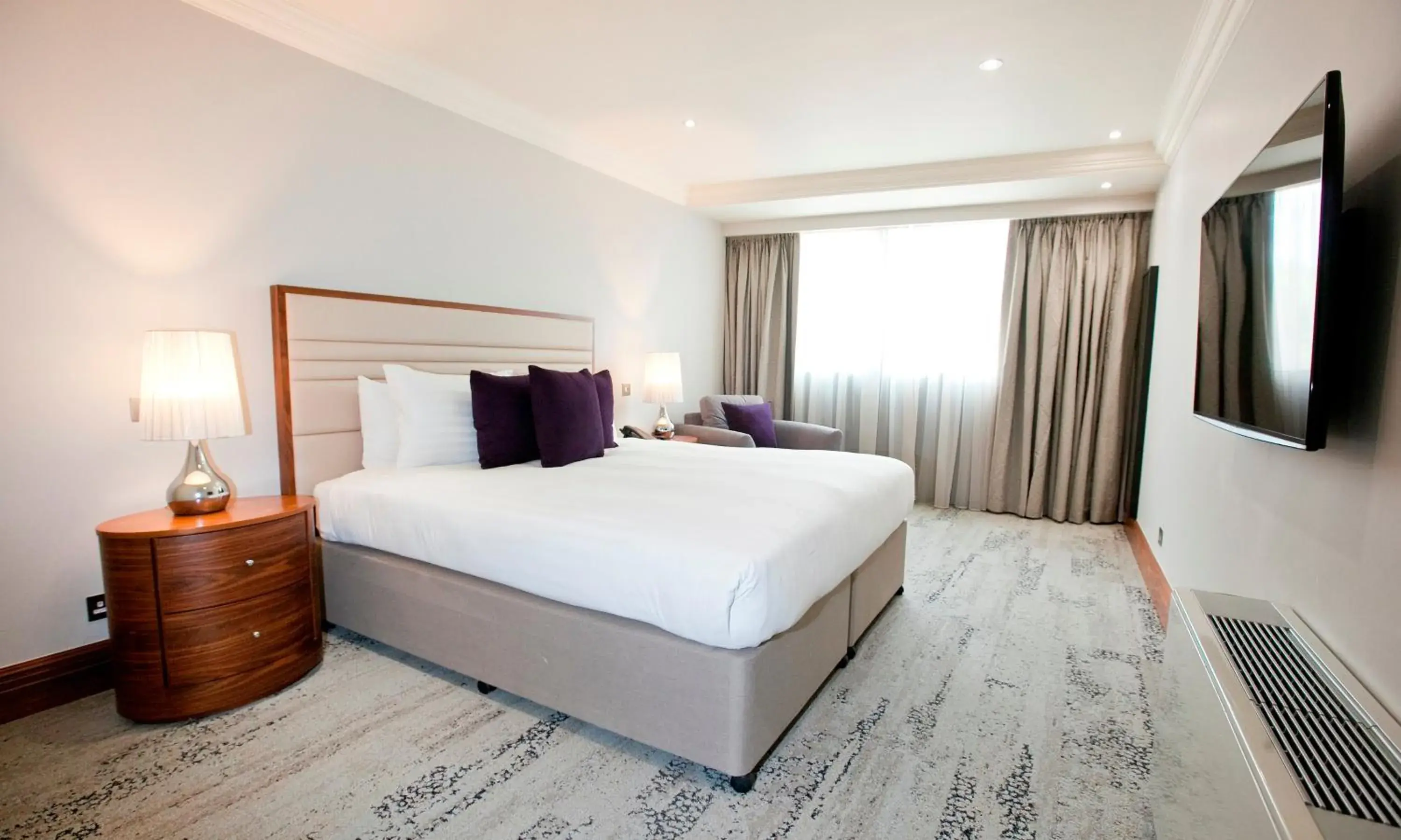 Bed in Sanctum International Serviced Apartments