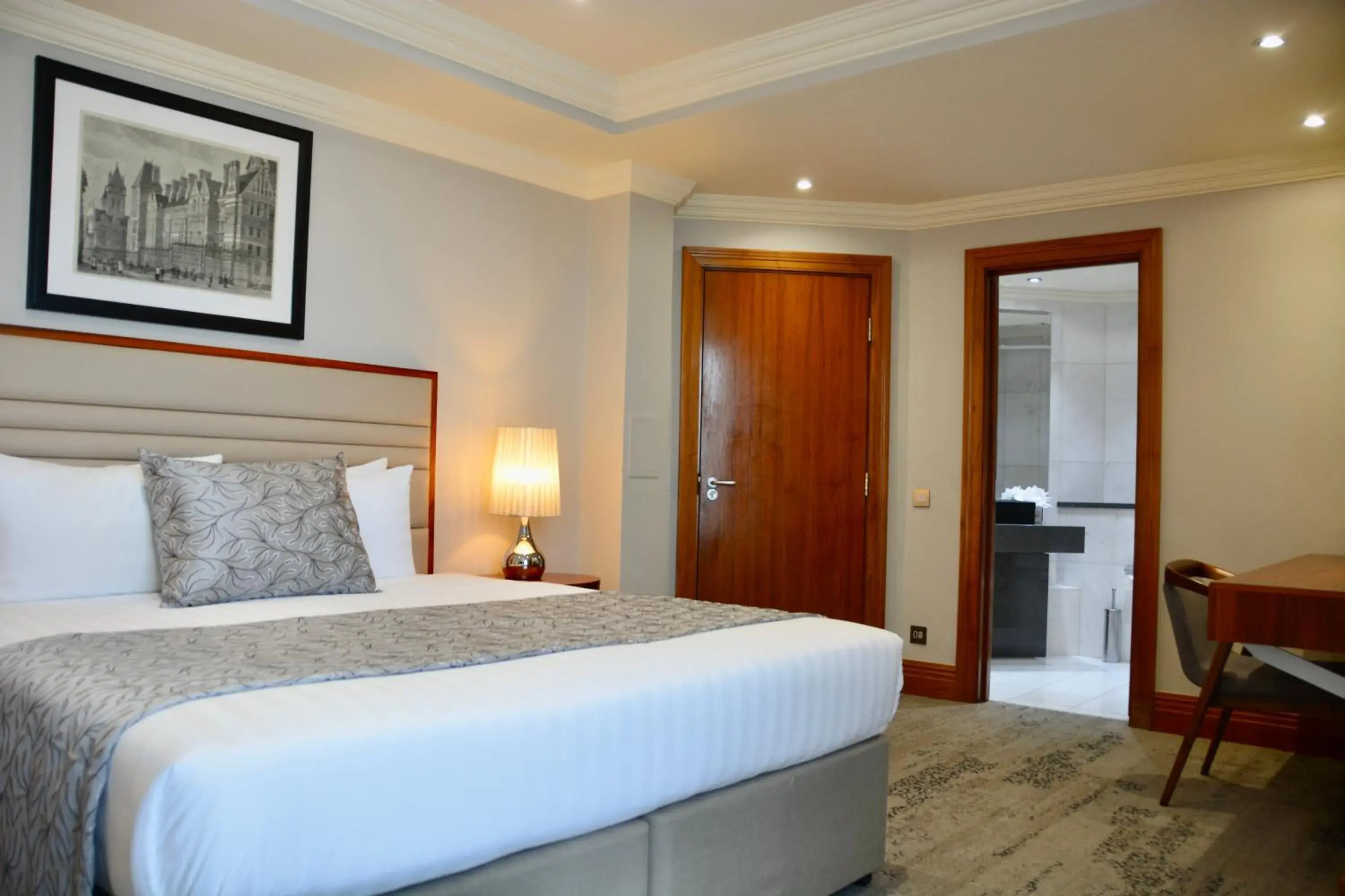 Bed in Sanctum International Serviced Apartments