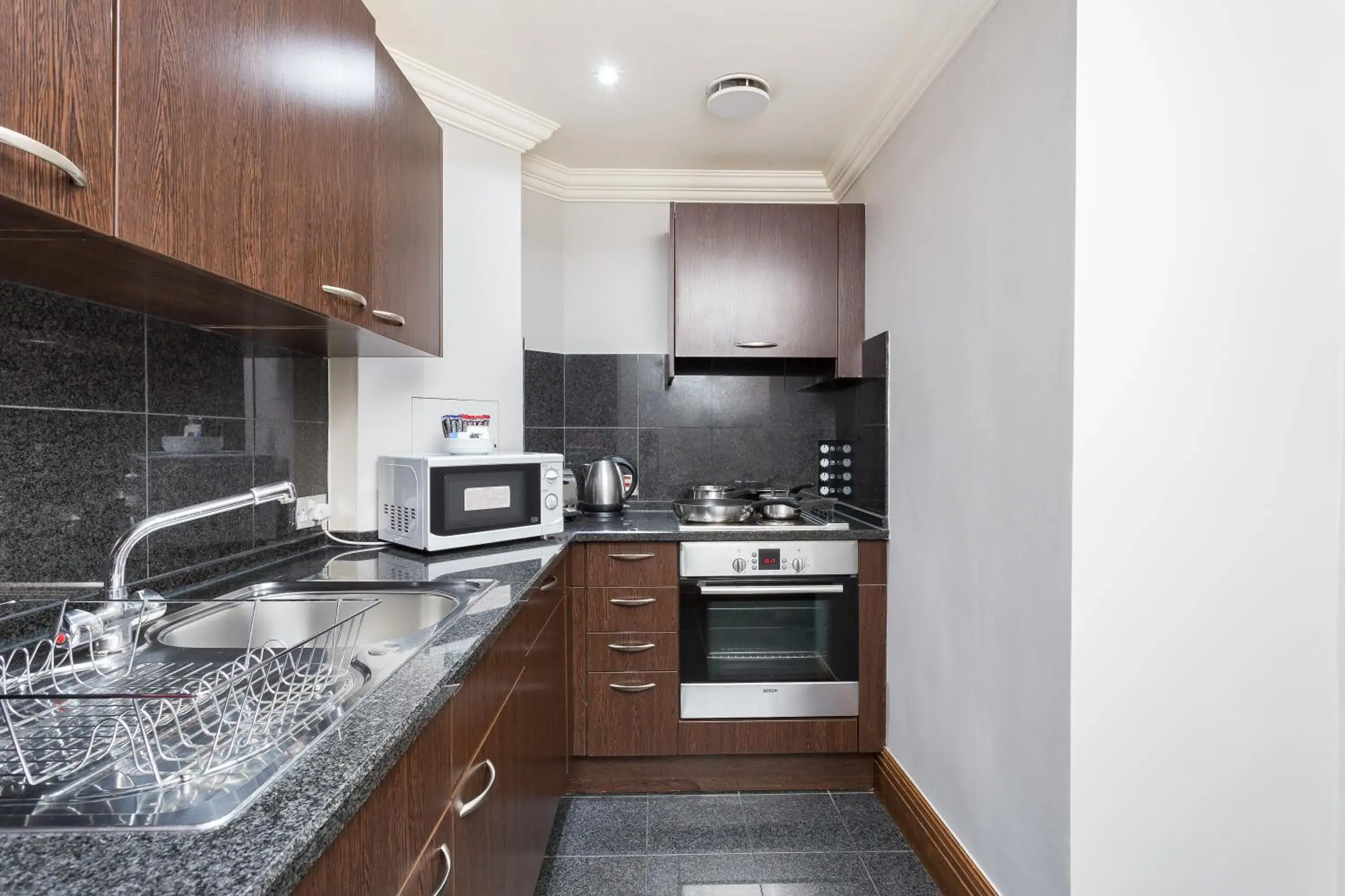 Kitchen or kitchenette, Kitchen/Kitchenette in Sanctum International Serviced Apartments