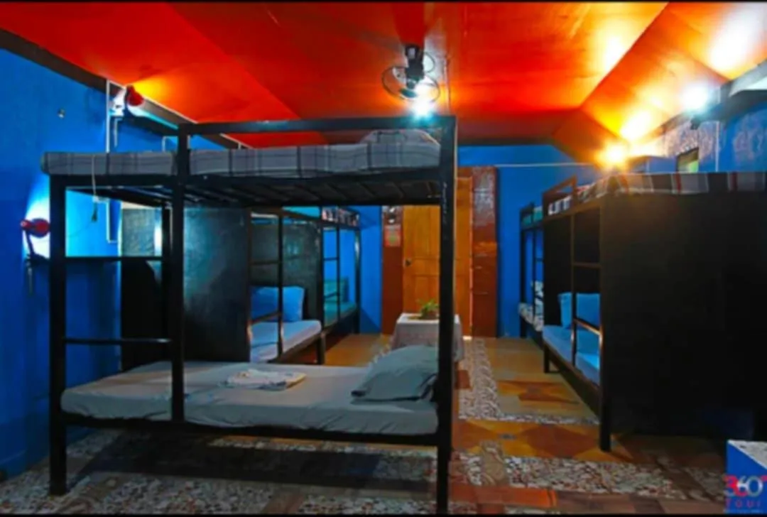 Bed in Adriana's Place Tropical Guesthouse