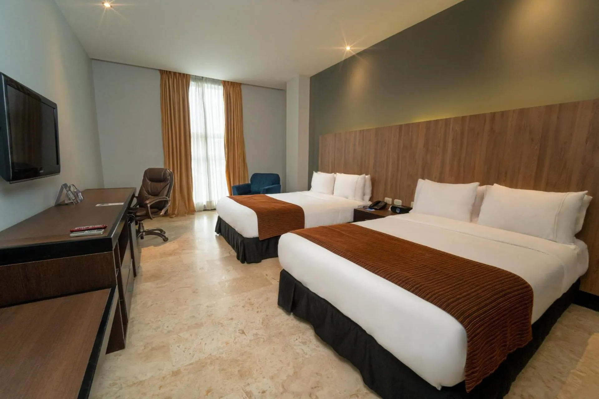 Photo of the whole room, Bed in GHL Hotel Barranquilla