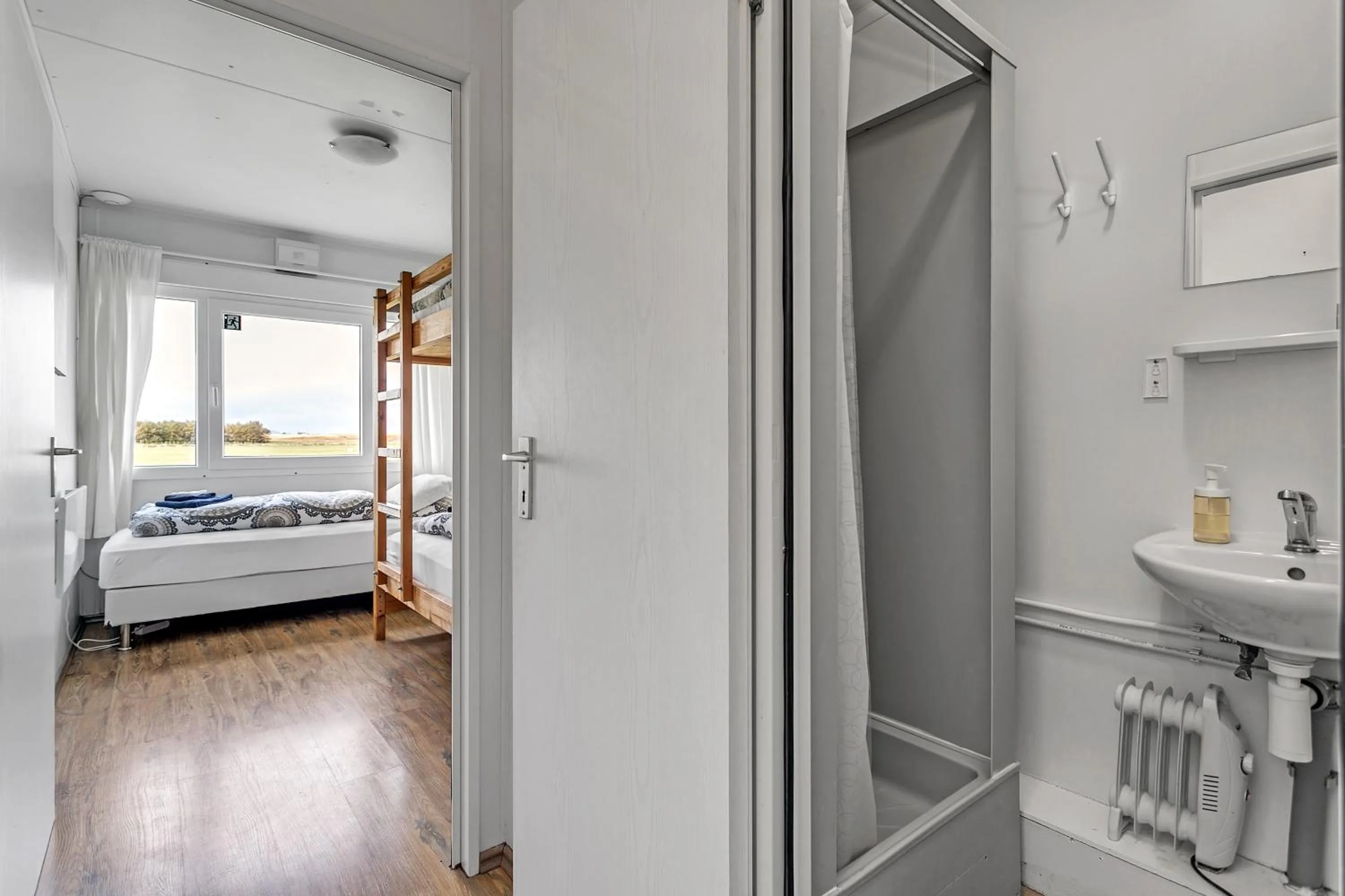 Bathroom, Bed in Guesthouse Vatnsholt