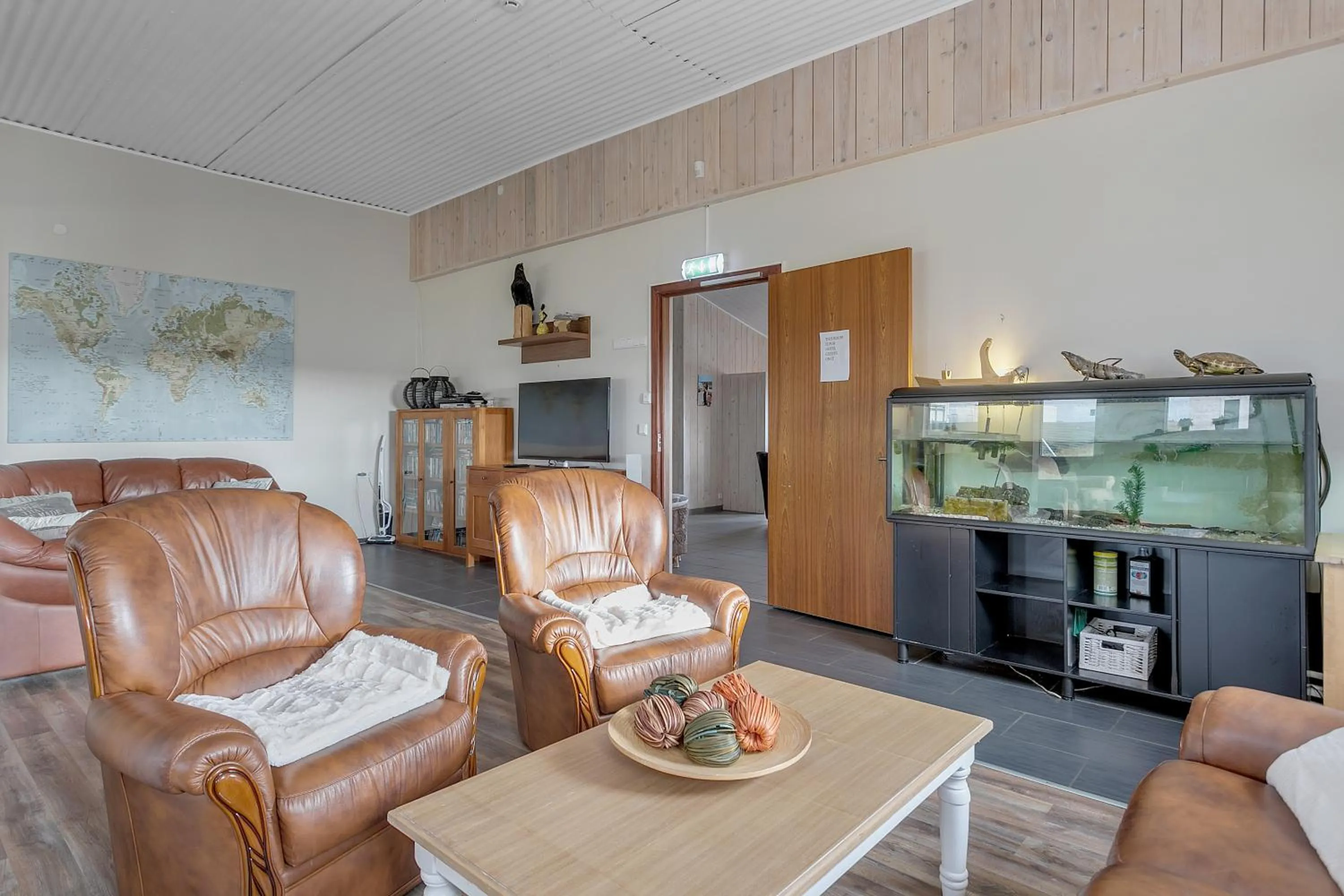 Communal lounge/ TV room in Guesthouse Vatnsholt