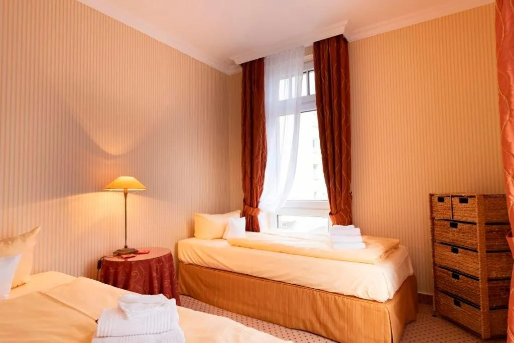 Photo of the whole room, Bed in Strandhotel Sylt Westerland