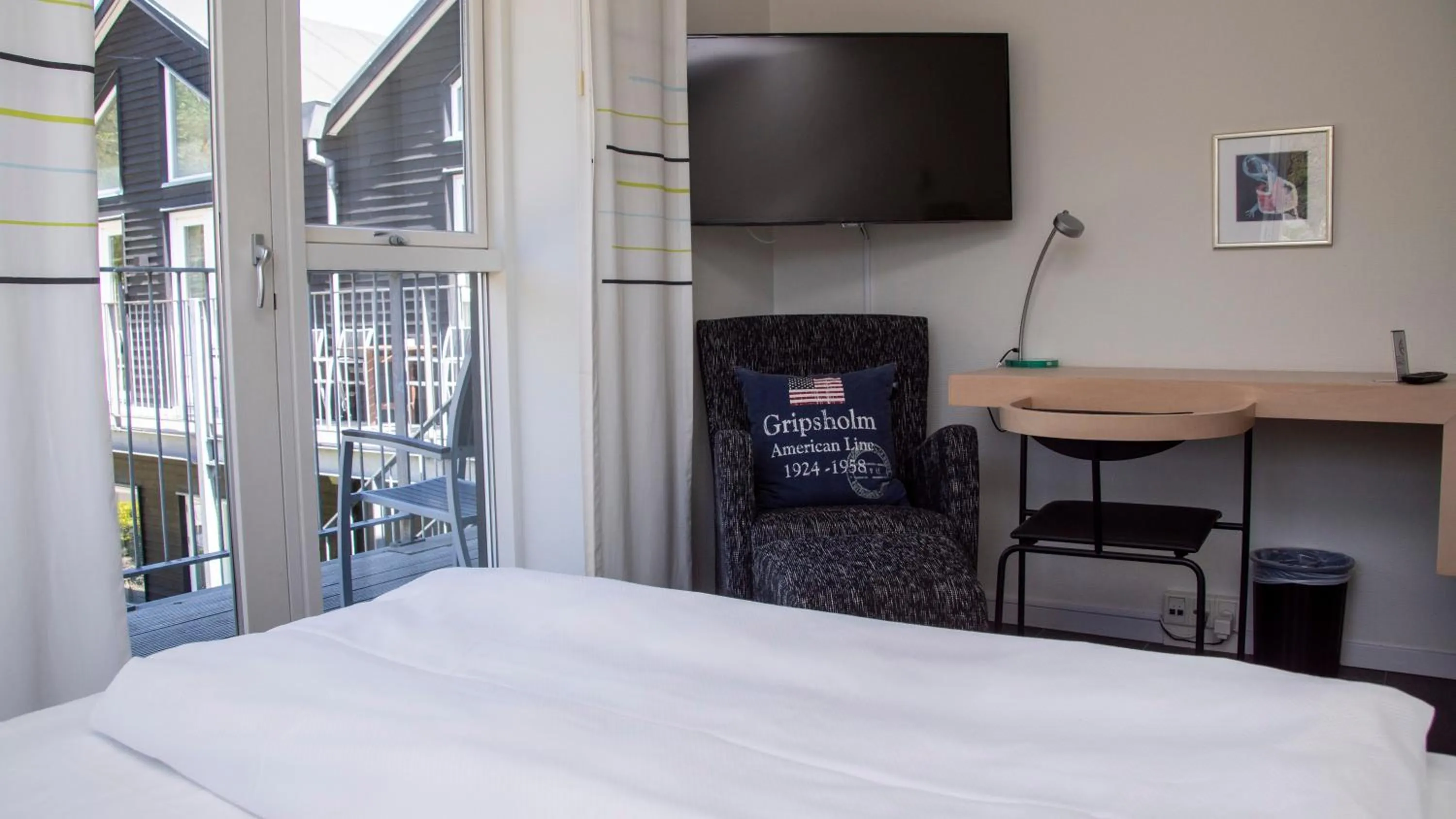 Photo of the whole room, Bed in Hotel Strandtangen