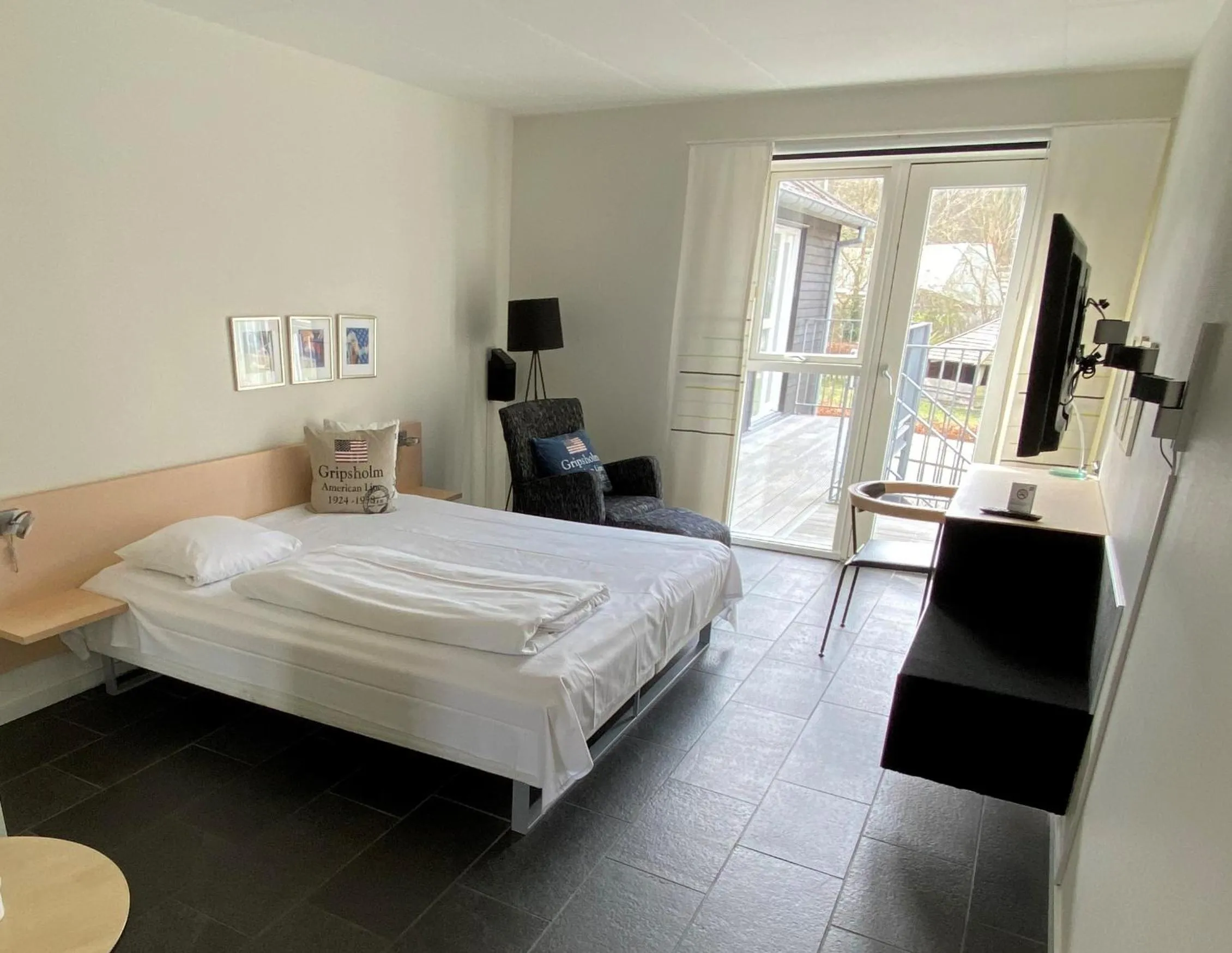 Photo of the whole room, Bed in Hotel Strandtangen