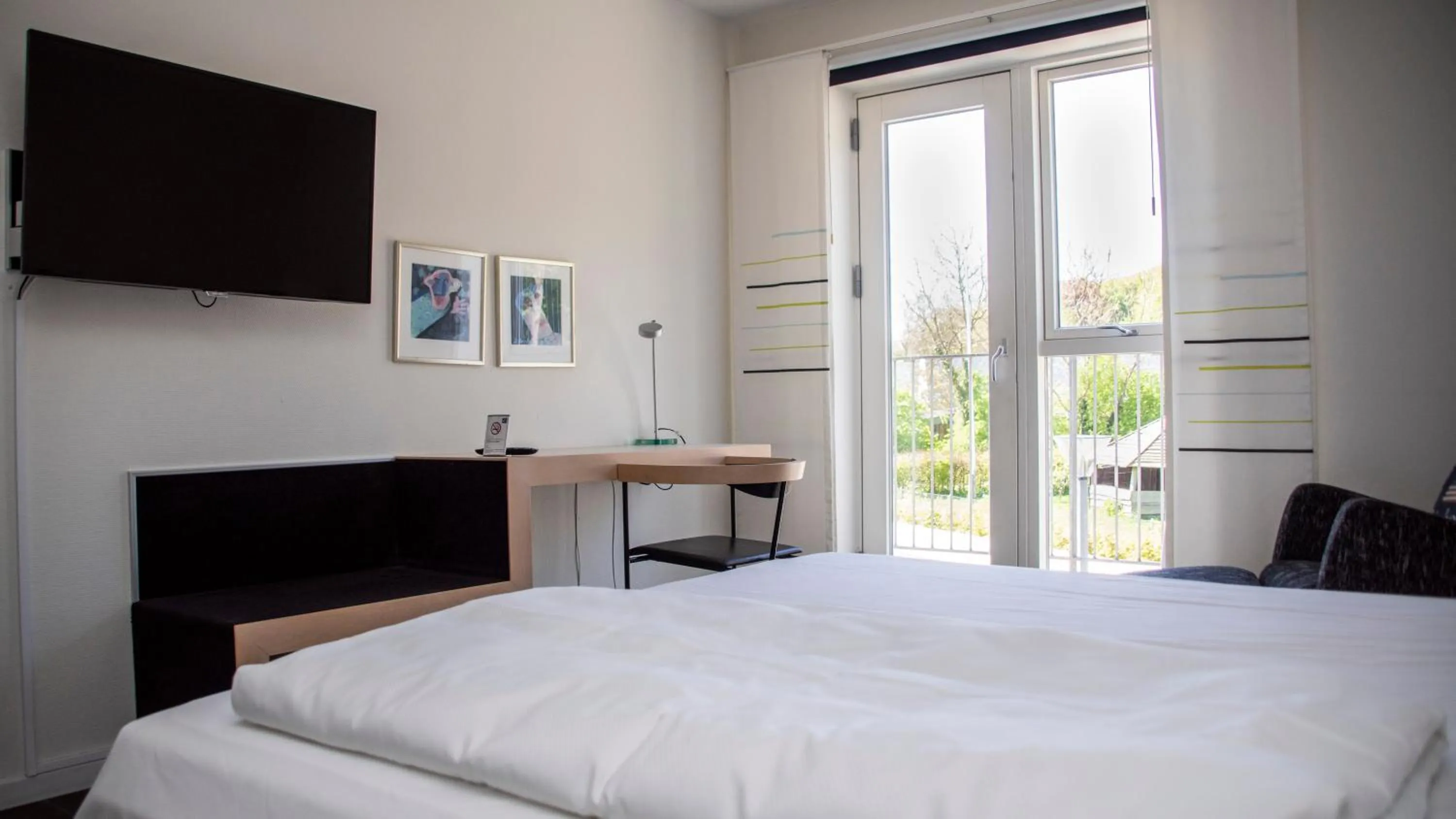 Photo of the whole room, Bed in Hotel Strandtangen