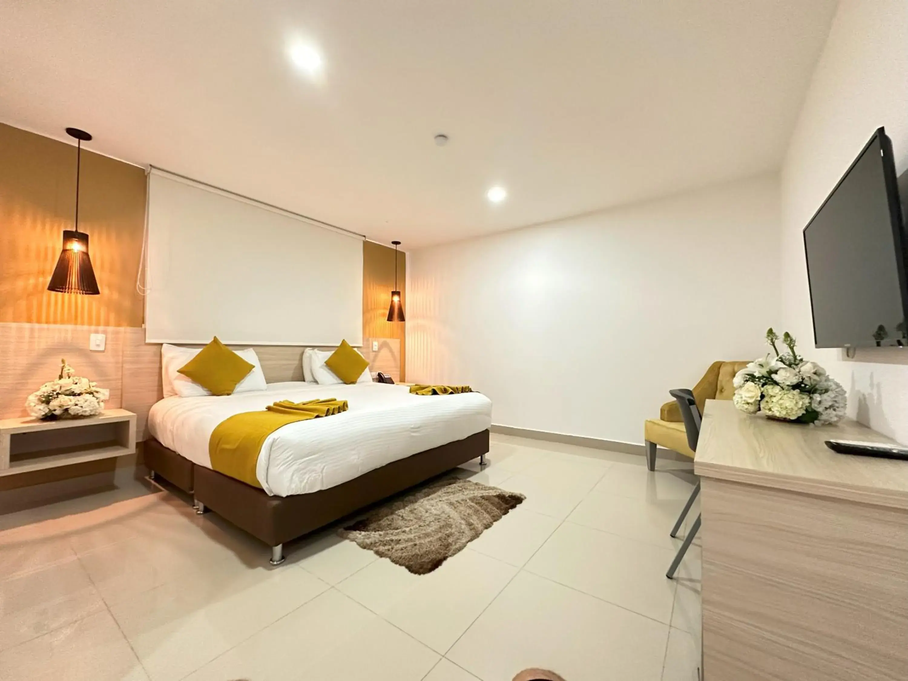 Photo of the whole room, Bed in Hotel Tayrona del Mar Photo of the whole room, Bed in Hotel Tayrona del Mar