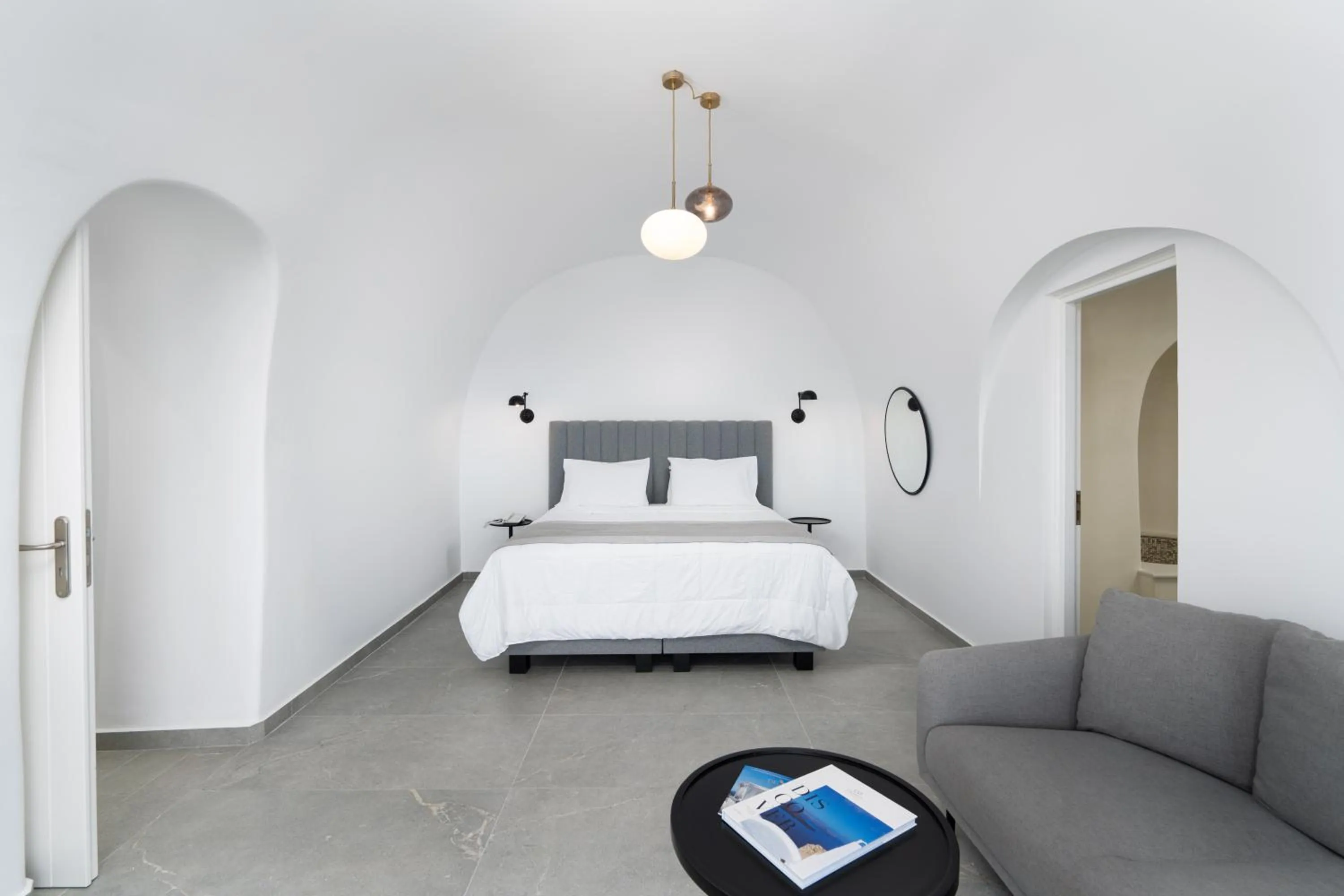 Bed in Petit Palace Suites