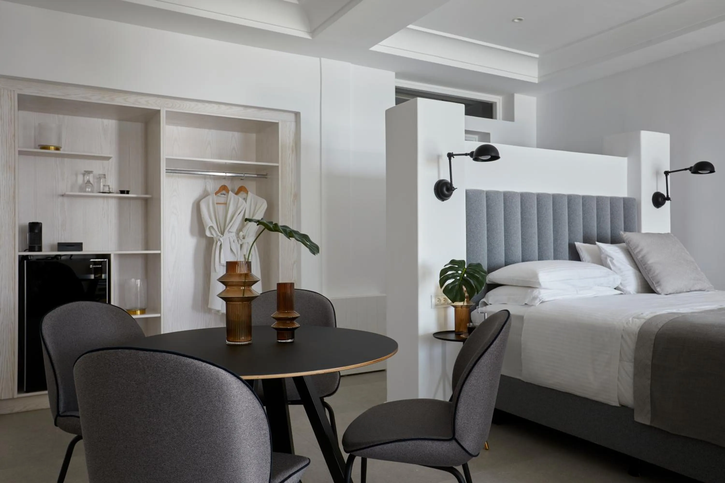 Bed in Petit Palace Suites