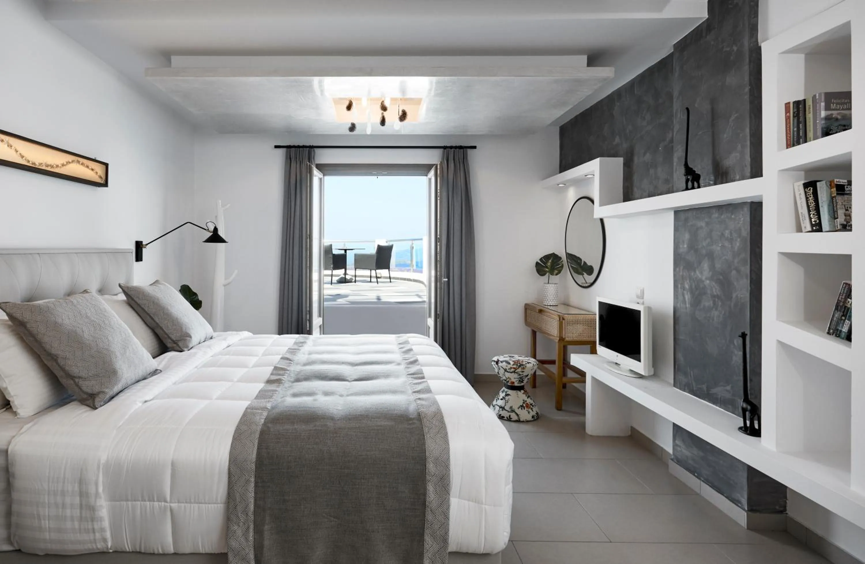 Bed in Petit Palace Suites