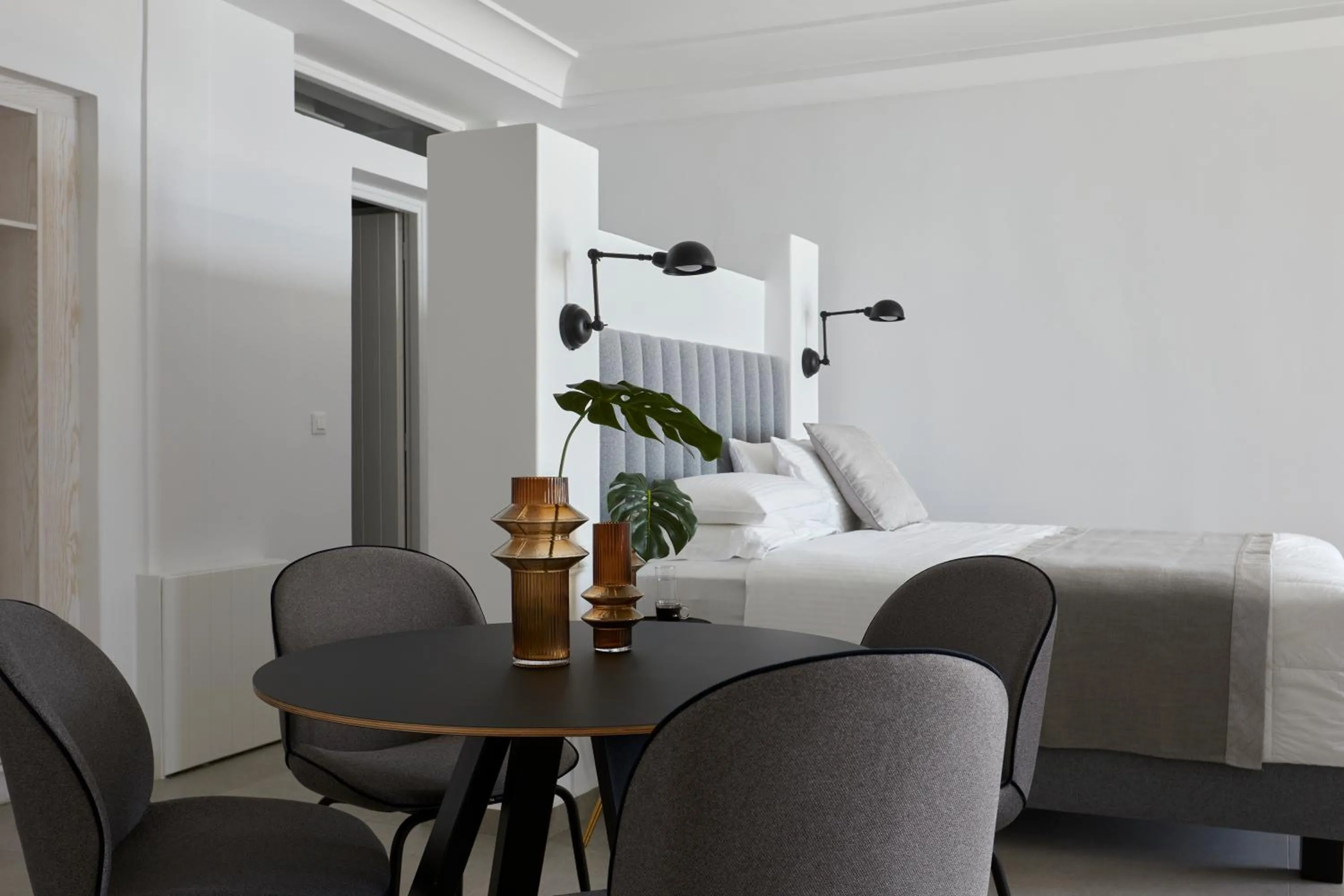 Bed in Petit Palace Suites